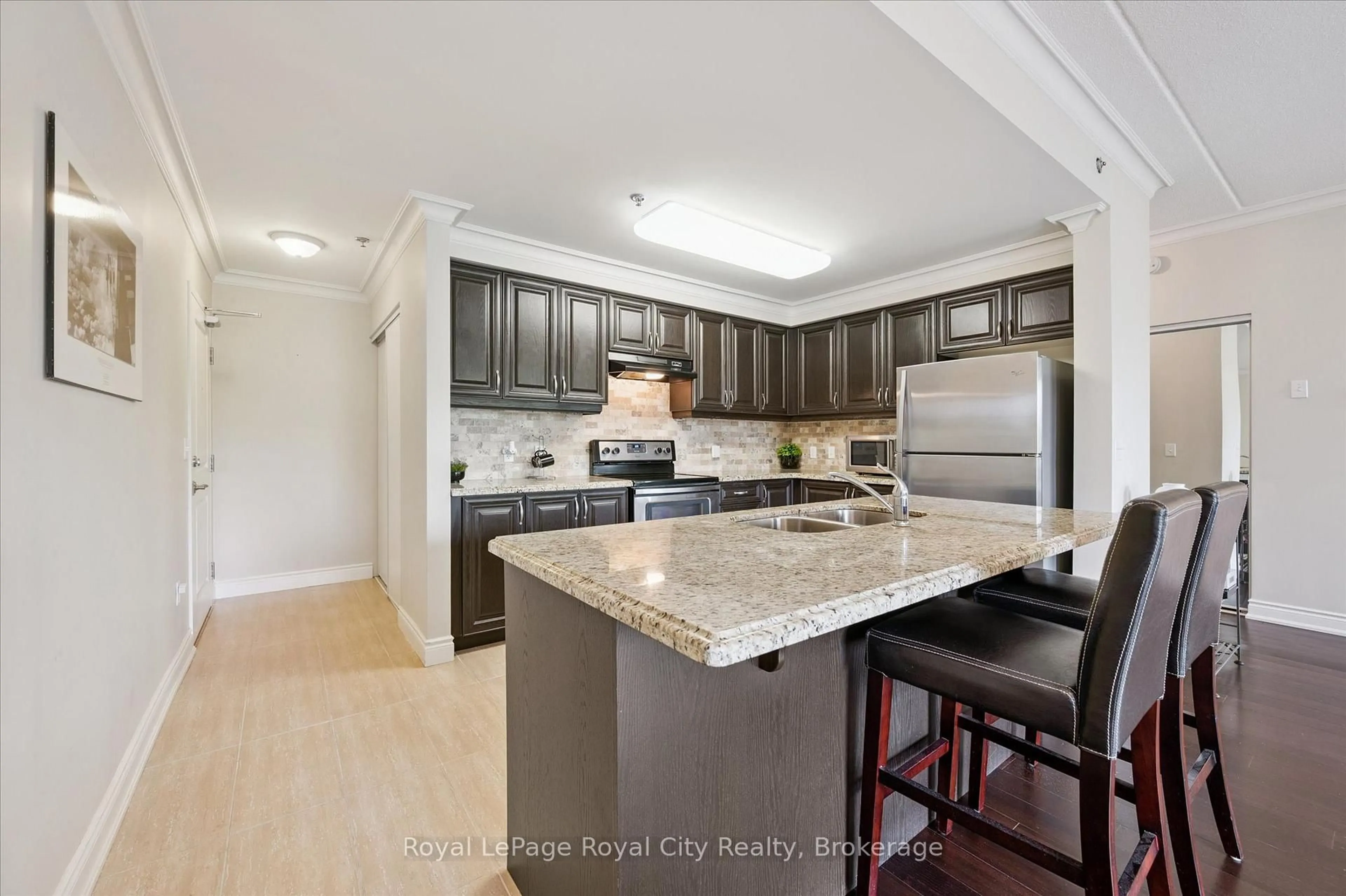 Open concept kitchen, ceramic/tile floor for 1440 Gordon St #122, Guelph Ontario N1L 1C8