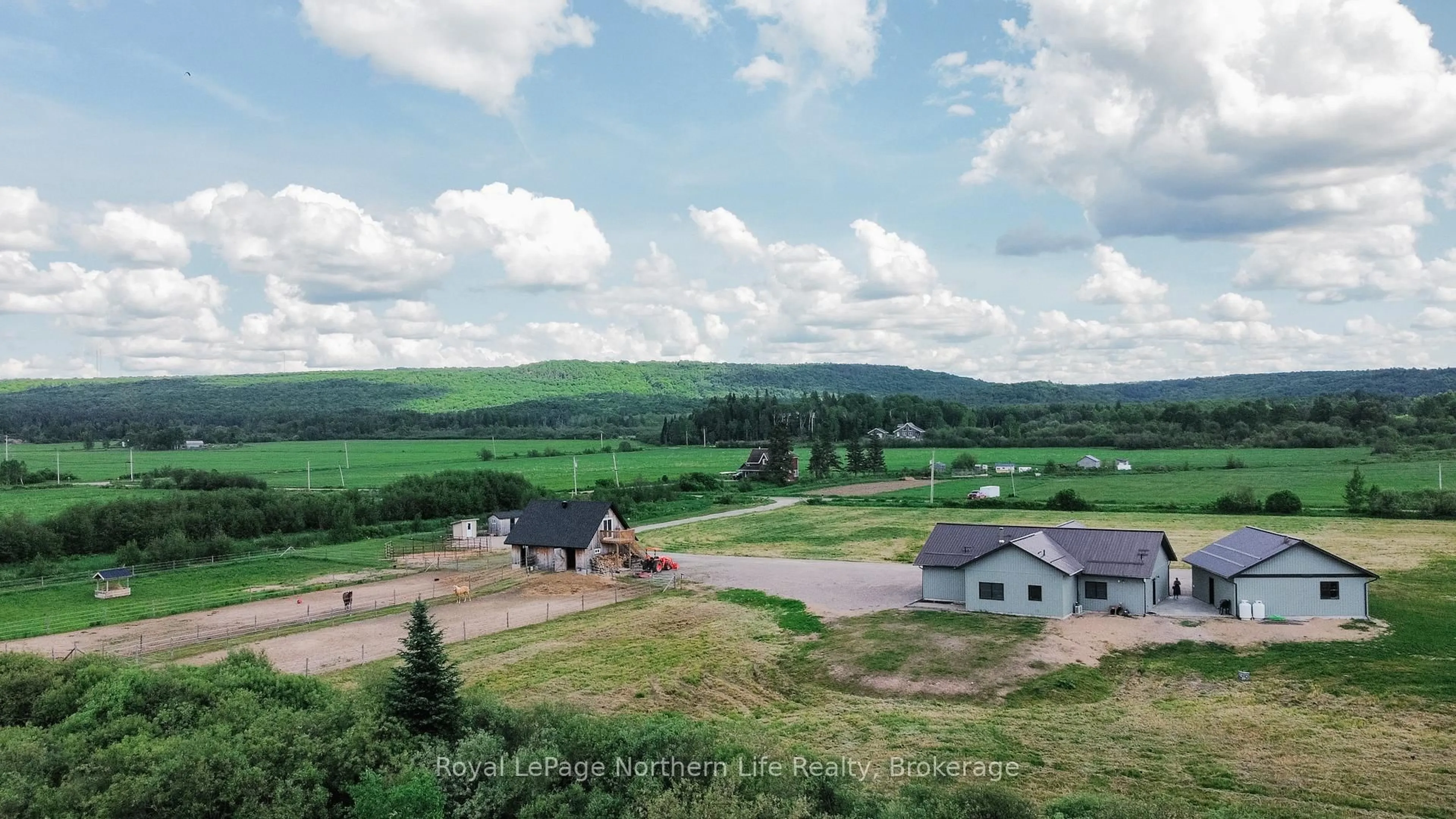 A pic from outside/outdoor area/front of a property/back of a property/a pic from drone, mountain view for 42 Simpson Hill Rd, Nipissing Ontario P0H 1W0