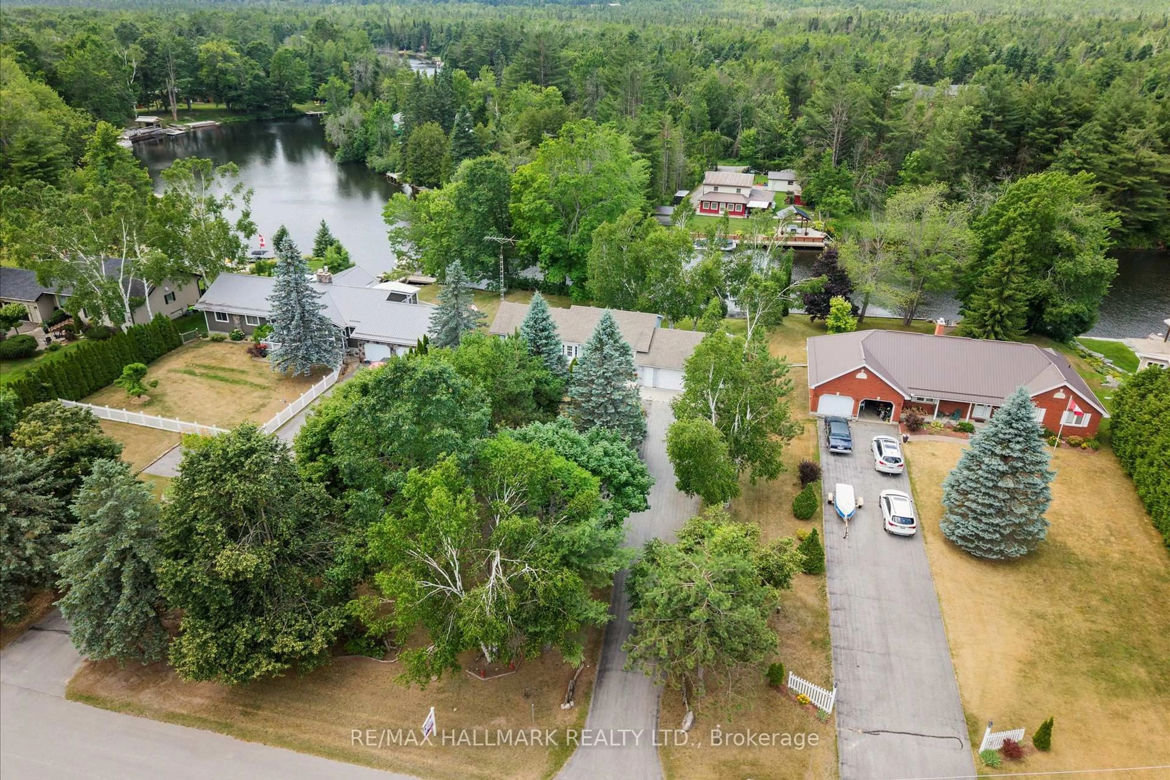 A pic from outside/outdoor area/front of a property/back of a property/a pic from drone, water/lake/river/ocean view for 6 Evans Dr, Kawartha Lakes Ontario K0M 1N0