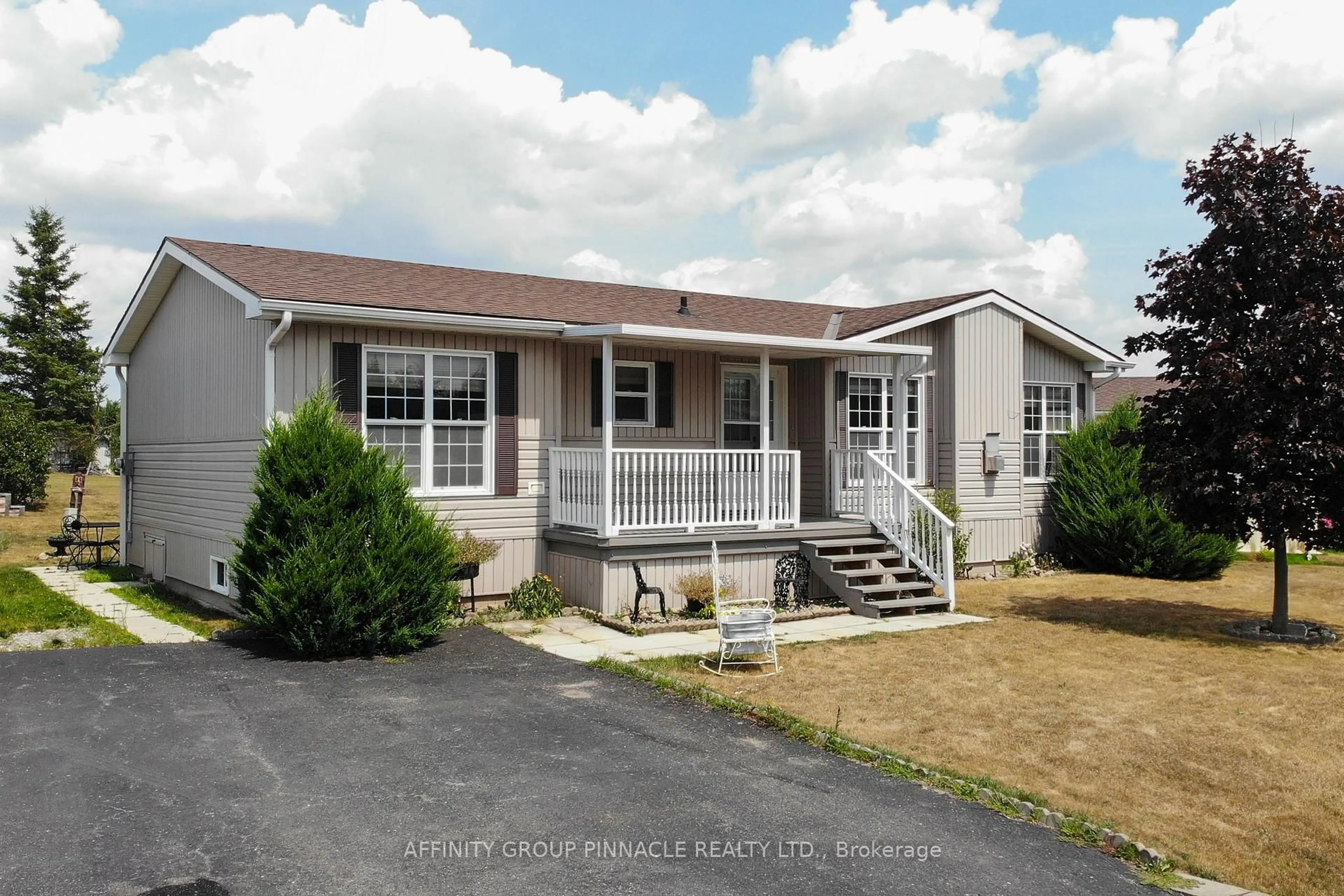 Home with vinyl exterior material, street for 20 Creekside Circ, Kawartha Lakes Ontario K0M 1L0