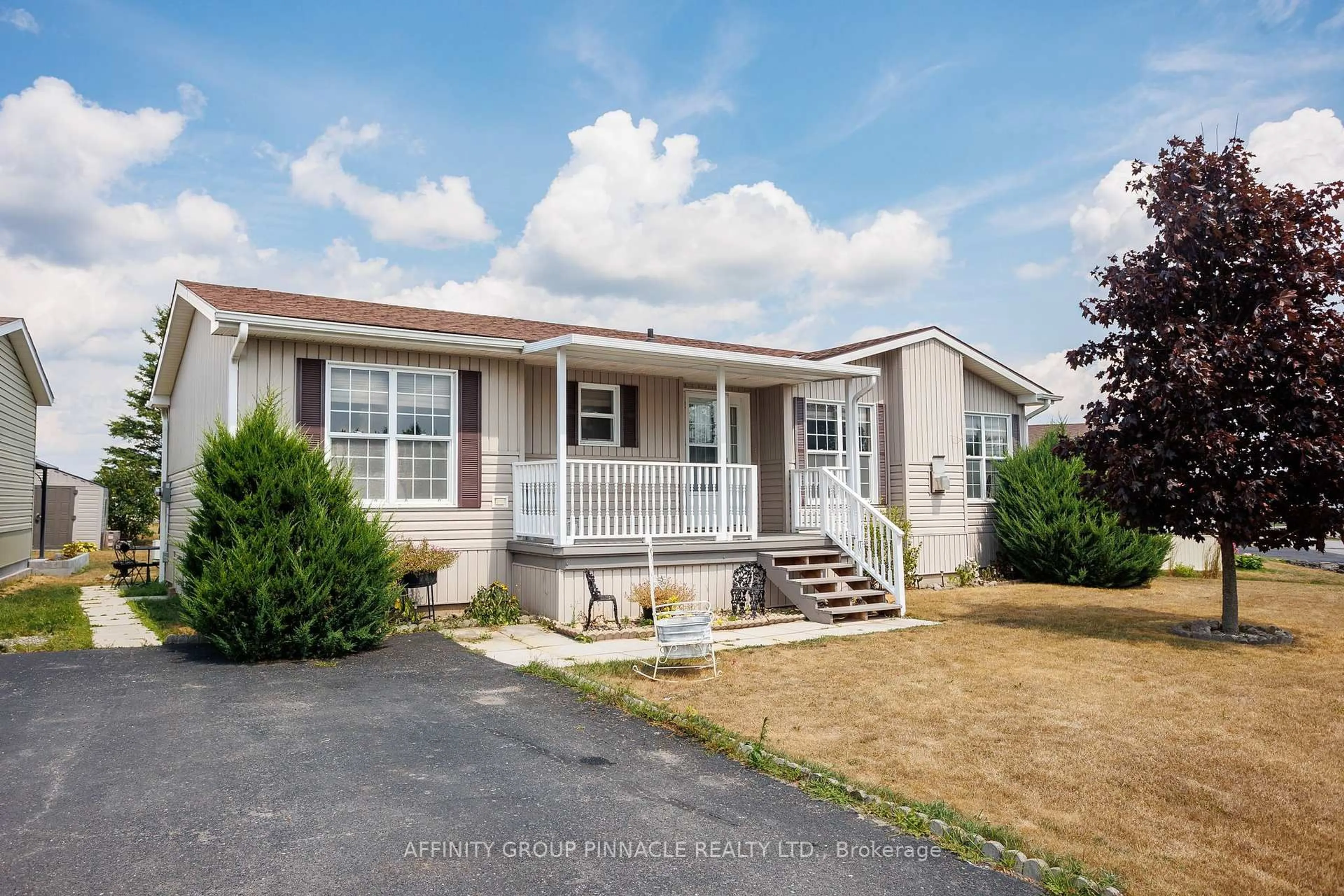 Home with vinyl exterior material, street for 20 Creekside Circ, Kawartha Lakes Ontario K0M 1L0