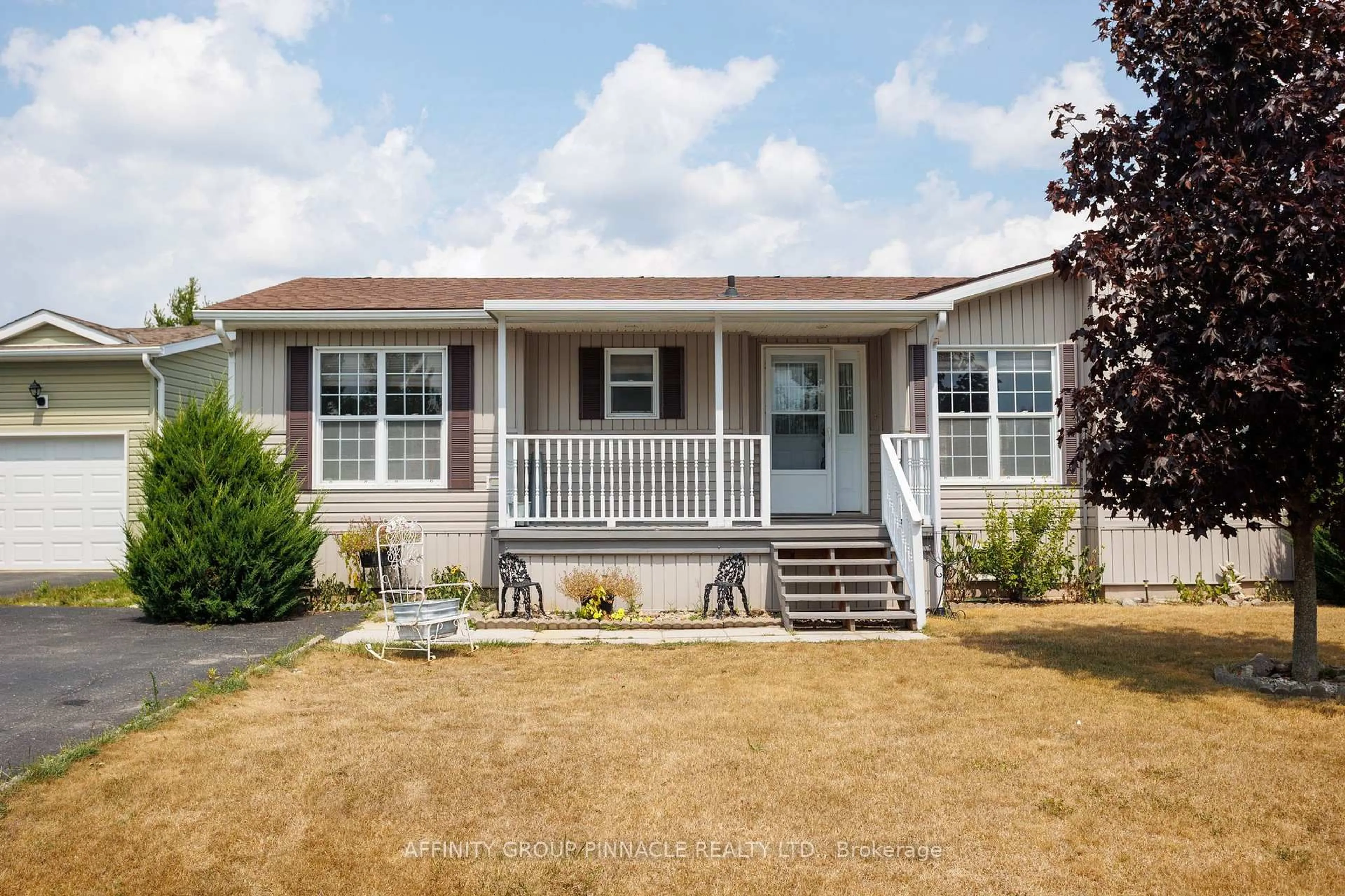 Home with vinyl exterior material, street for 20 Creekside Circ, Kawartha Lakes Ontario K0M 1L0