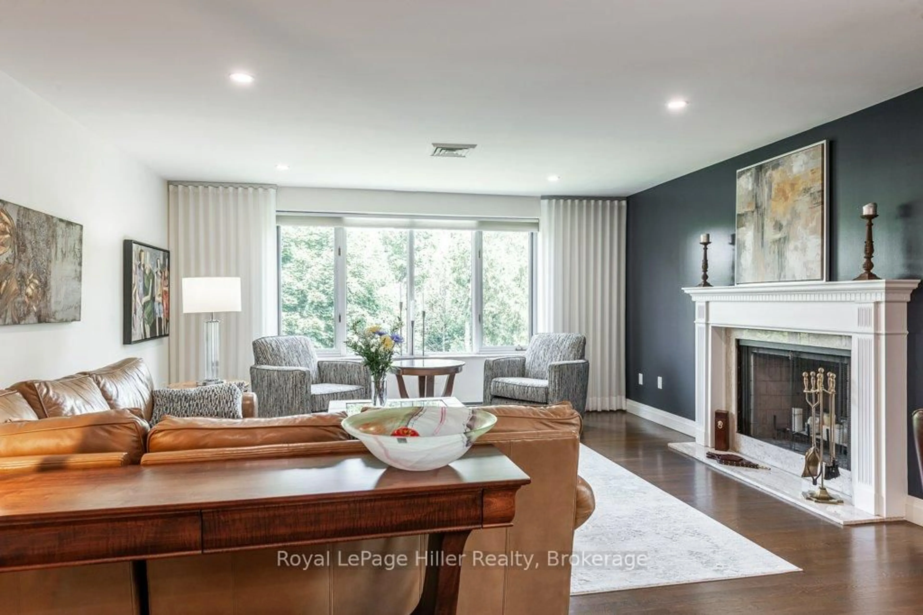 Living room with furniture, wood/laminate floor for 30 FRONT St #205, Stratford Ontario N5A 7S3