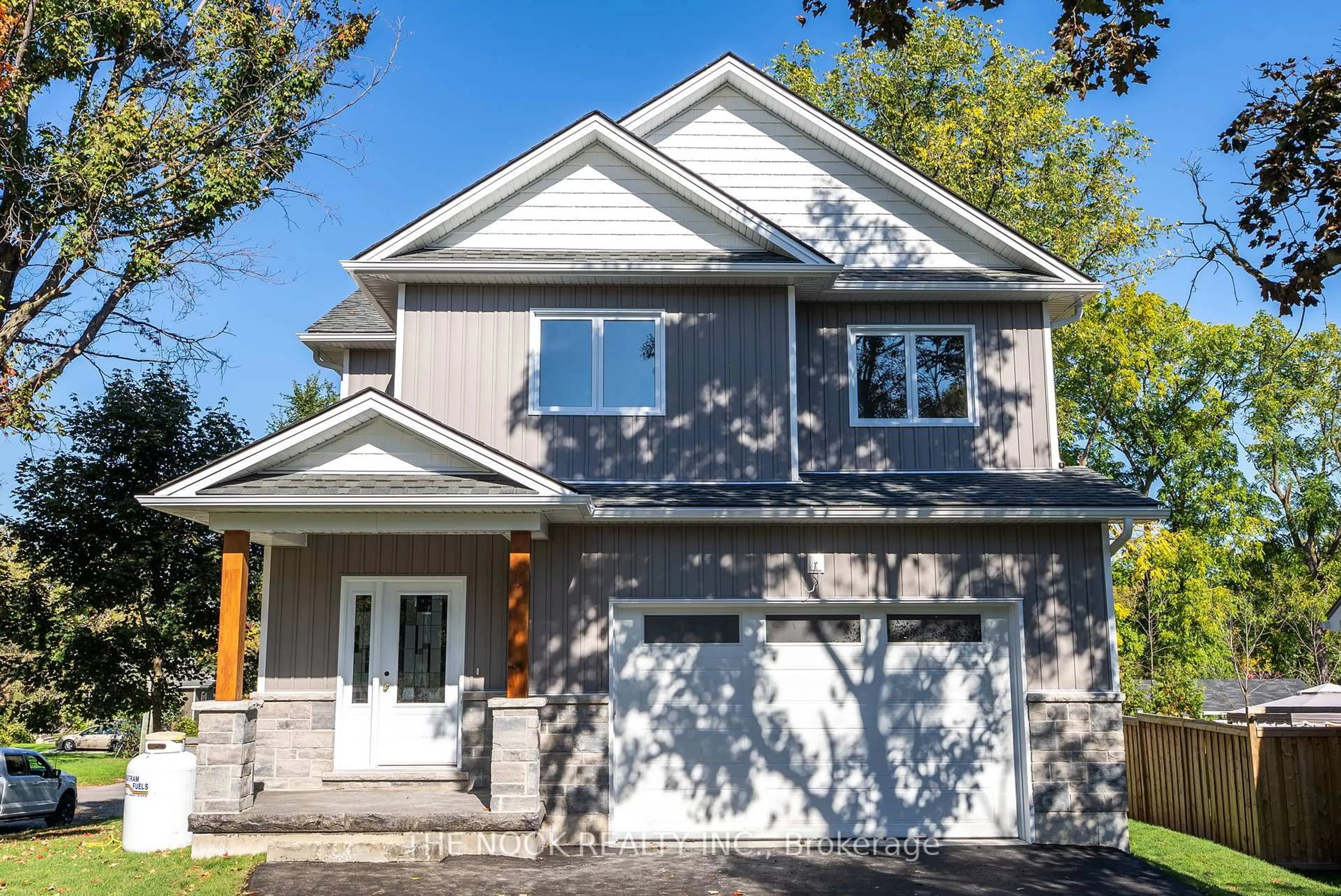 Home with vinyl exterior material, street for 50 Russell St, Kawartha Lakes Ontario K9V 2A6