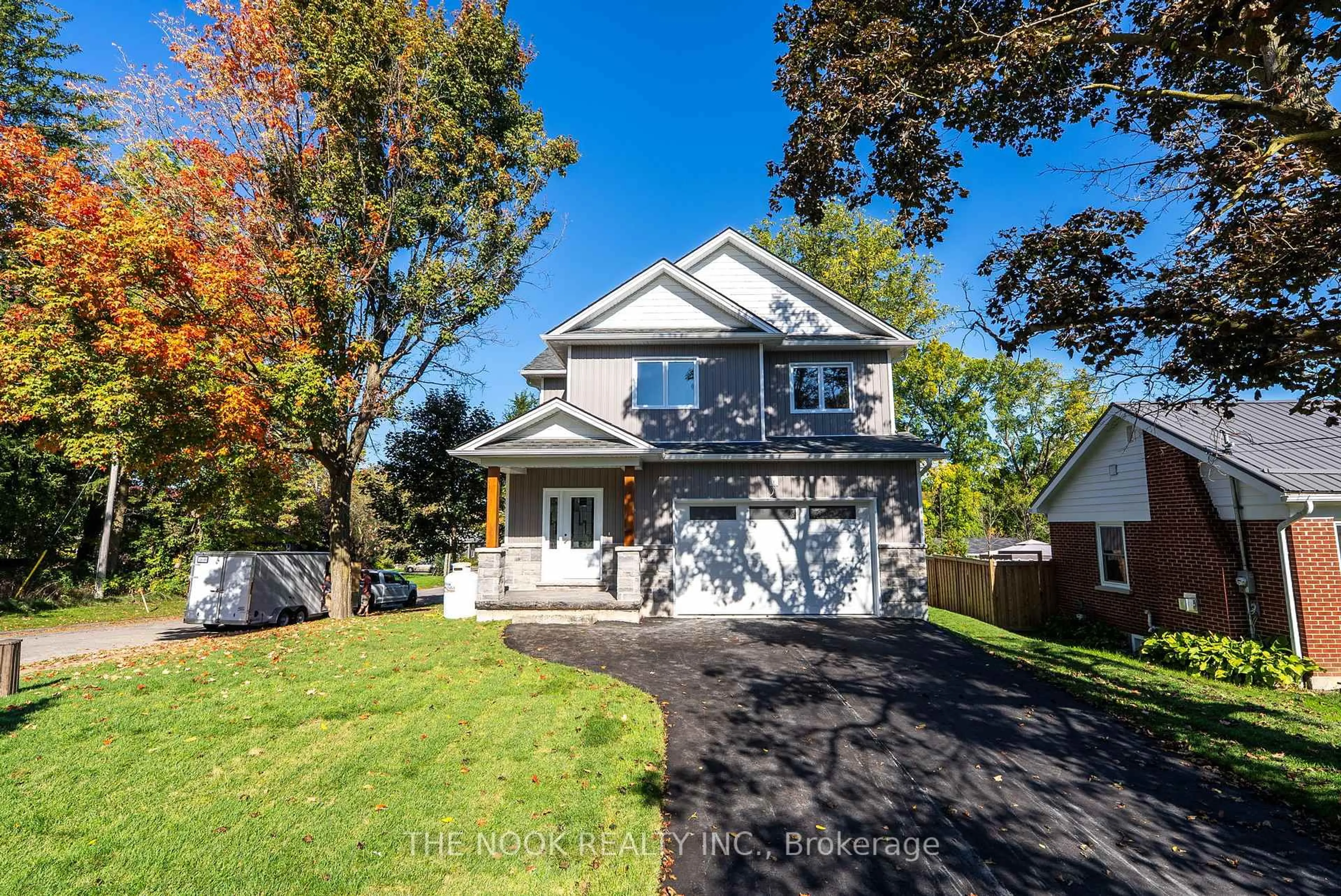 Home with vinyl exterior material, street for 50 Russell St, Kawartha Lakes Ontario K9V 2A6