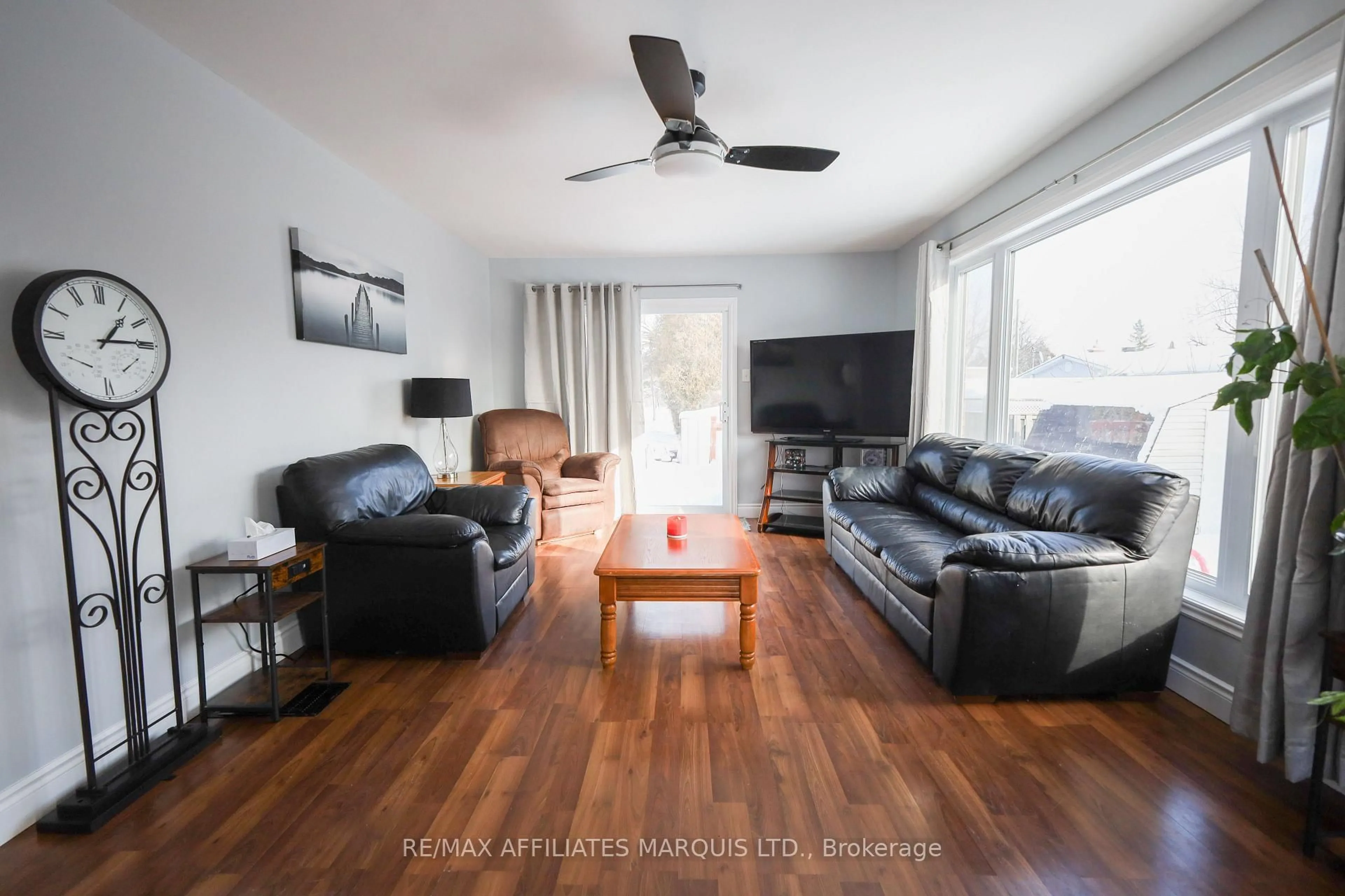 Living room with furniture, wood/laminate floor for 3 Fraser St, South Stormont Ontario K0C 2A0