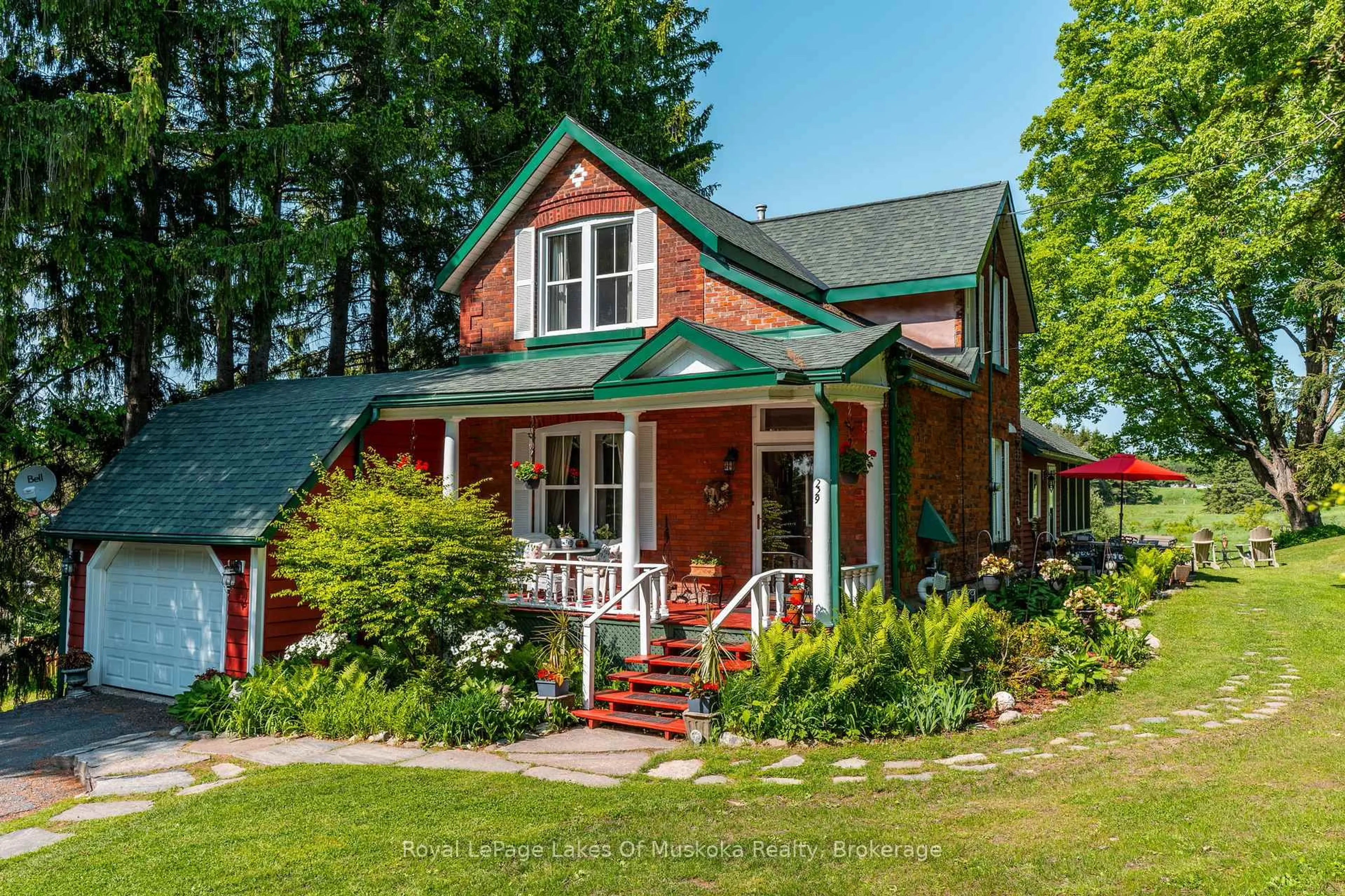 Home with brick exterior material, street for 229 Fraserburg Rd, Bracebridge Ontario P1L 0G9