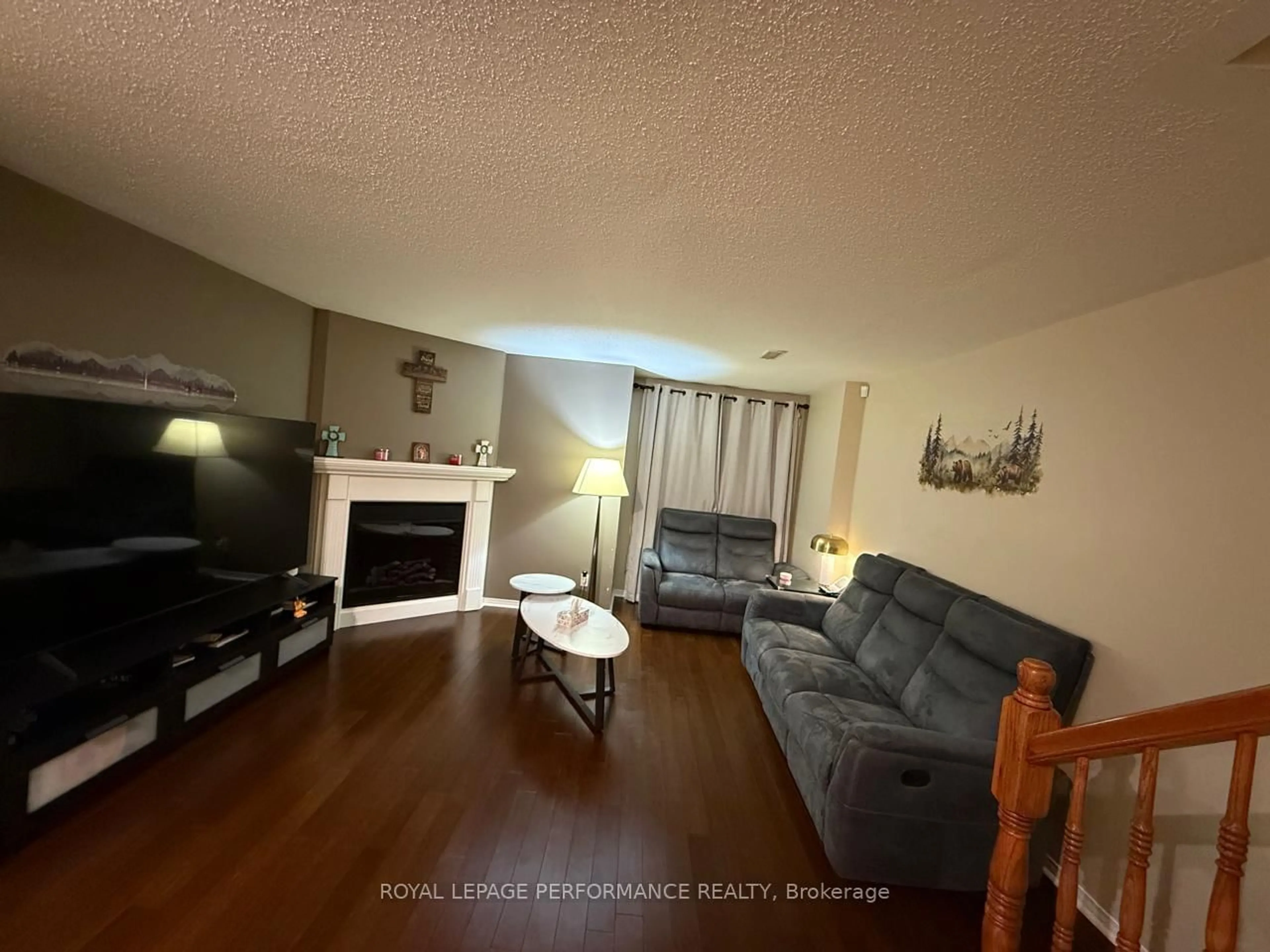Living room with furniture, wood/laminate floor for 390 CROWNRIDGE Dr, Kanata Ontario K2M 3A4