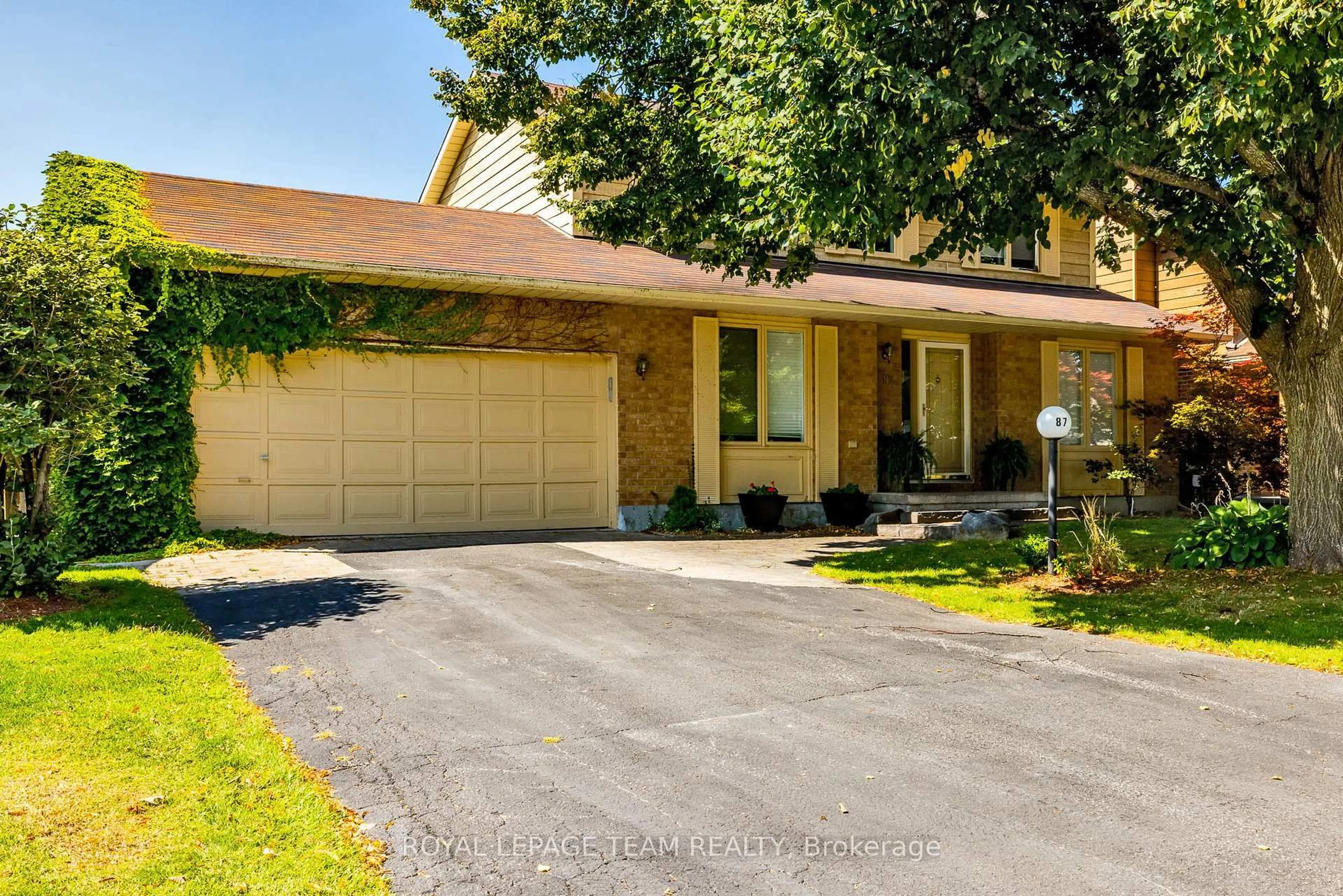 Home with brick exterior material, street for 87 BEECHFERN Dr, Stittsville Ontario K2S 1E3