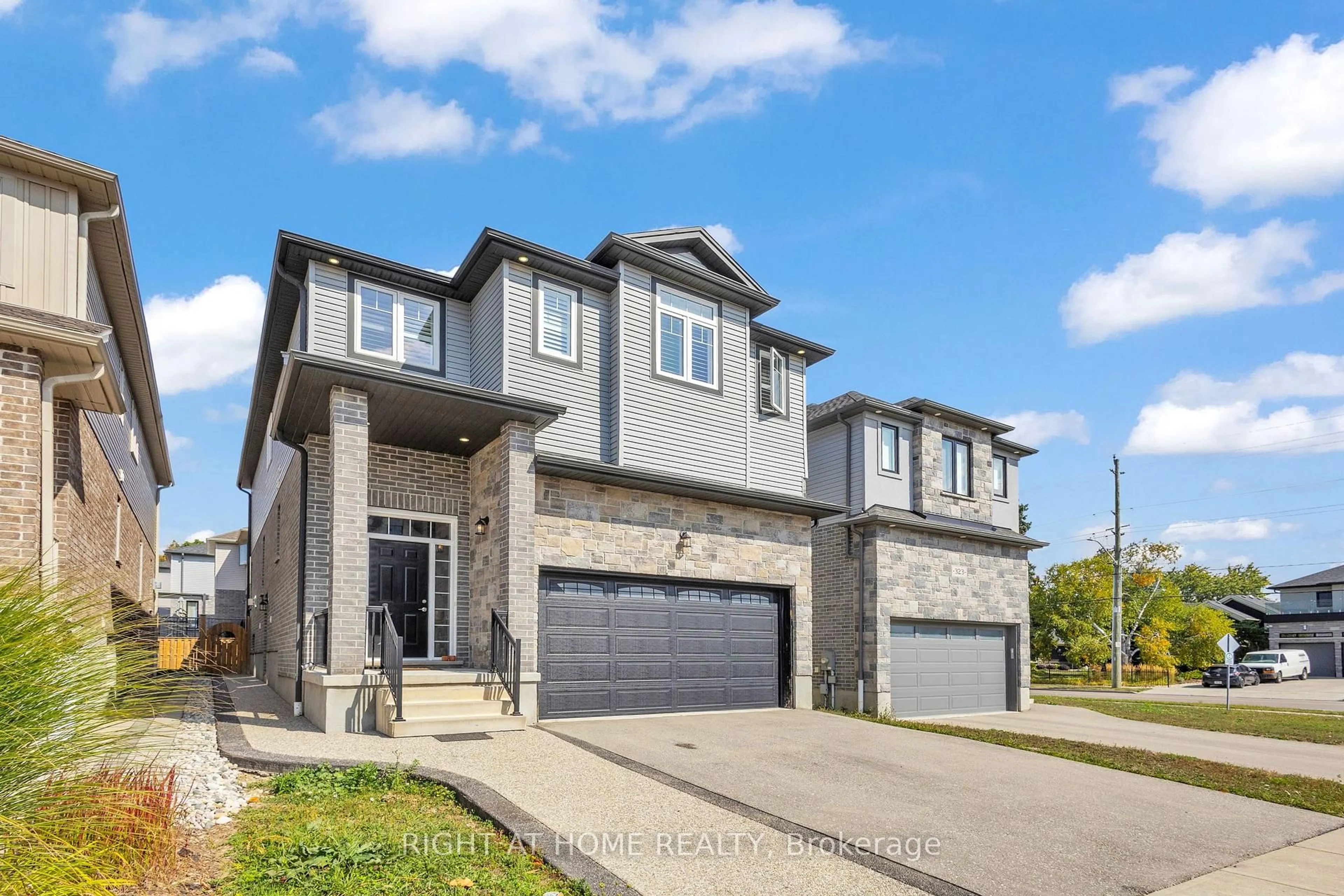 Home with brick exterior material, street for 321 Carriage Way, Waterloo Ontario N2K 0C2