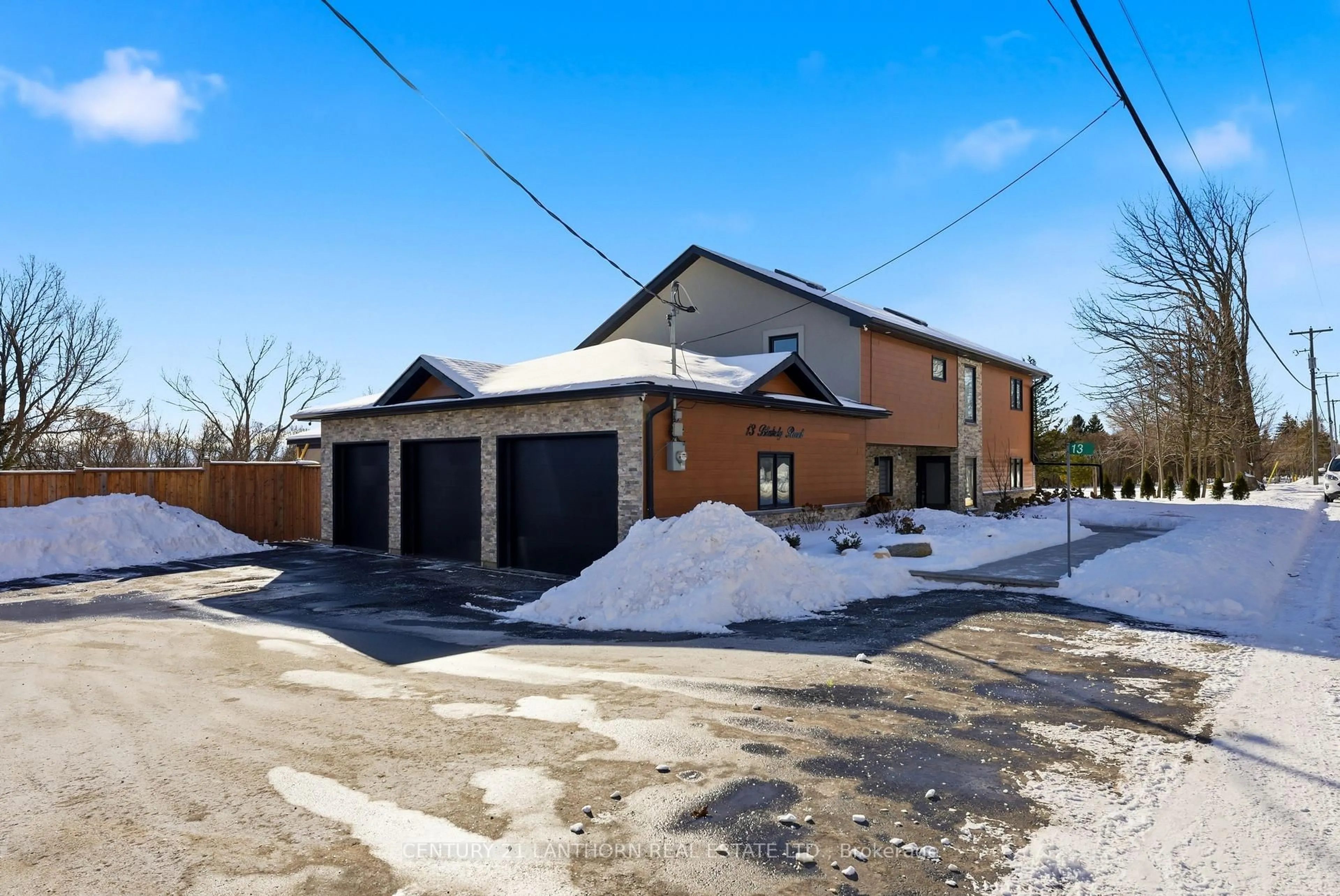 A pic from outside/outdoor area/front of a property/back of a property/a pic from drone, street for 13 Blakely Rd, Prince Edward County Ontario K0K 1T0
