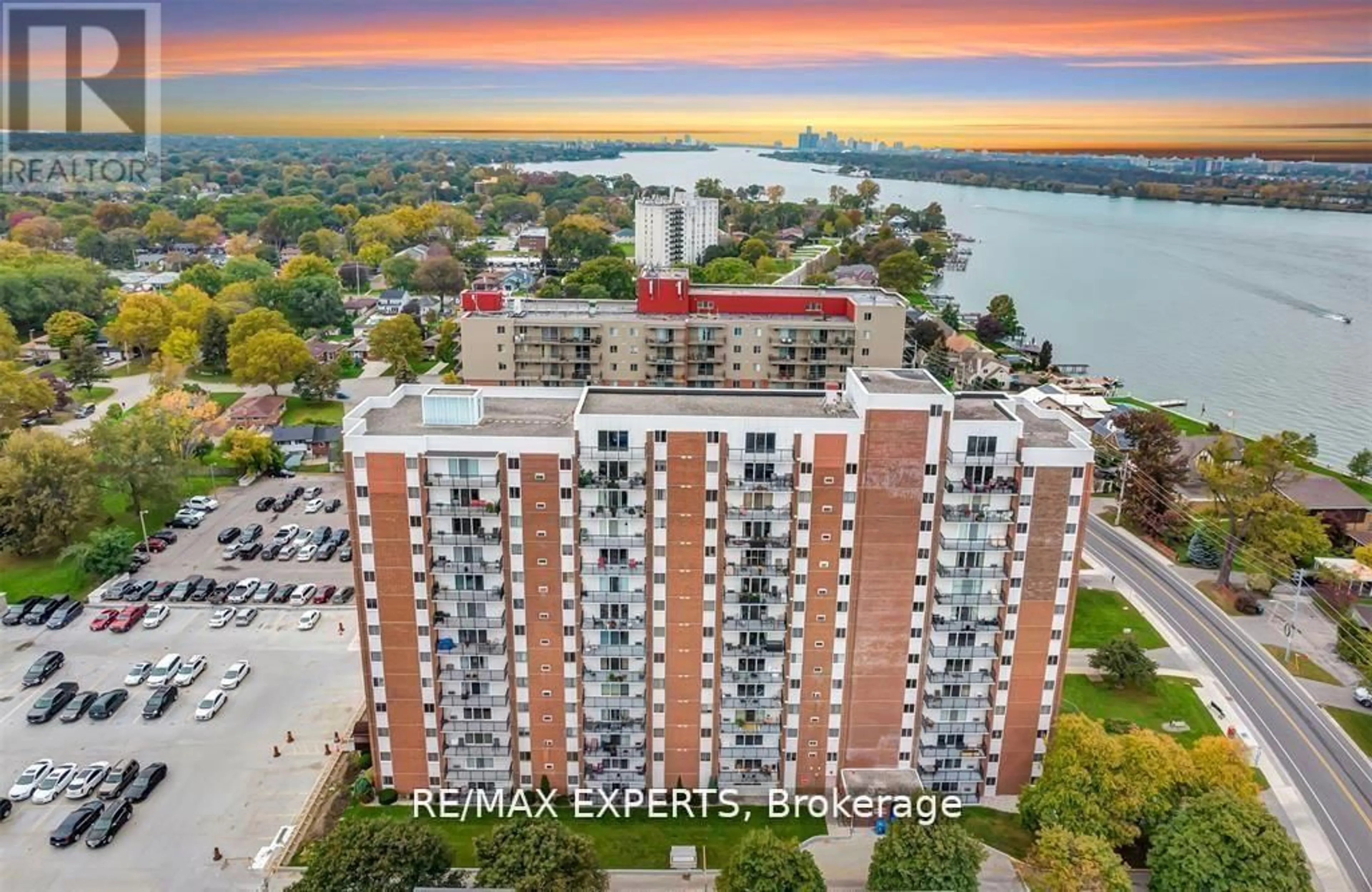 A pic from outside/outdoor area/front of a property/back of a property/a pic from drone, water/lake/river/ocean view for 8591 Riverside Dr #410, Windsor Ontario N8S 1G3