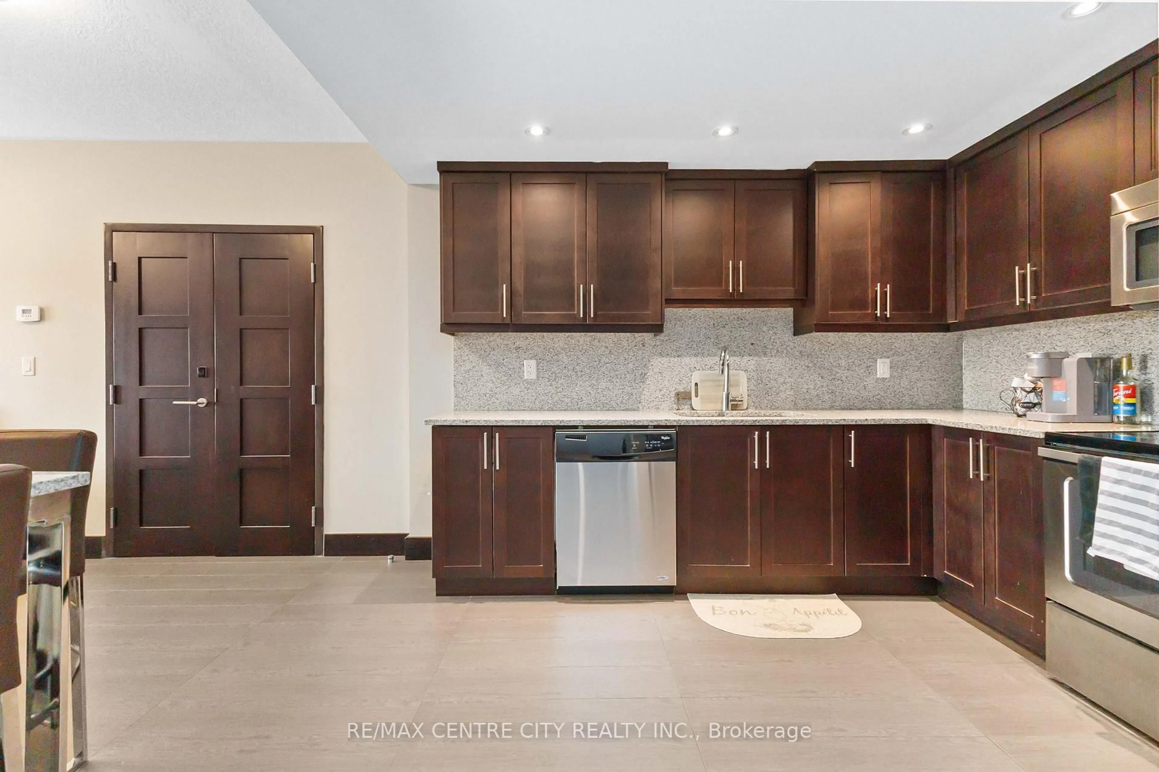Open concept kitchen, ceramic/tile floor for 1235 Richmond St #1218, London East Ontario N6A 0C1