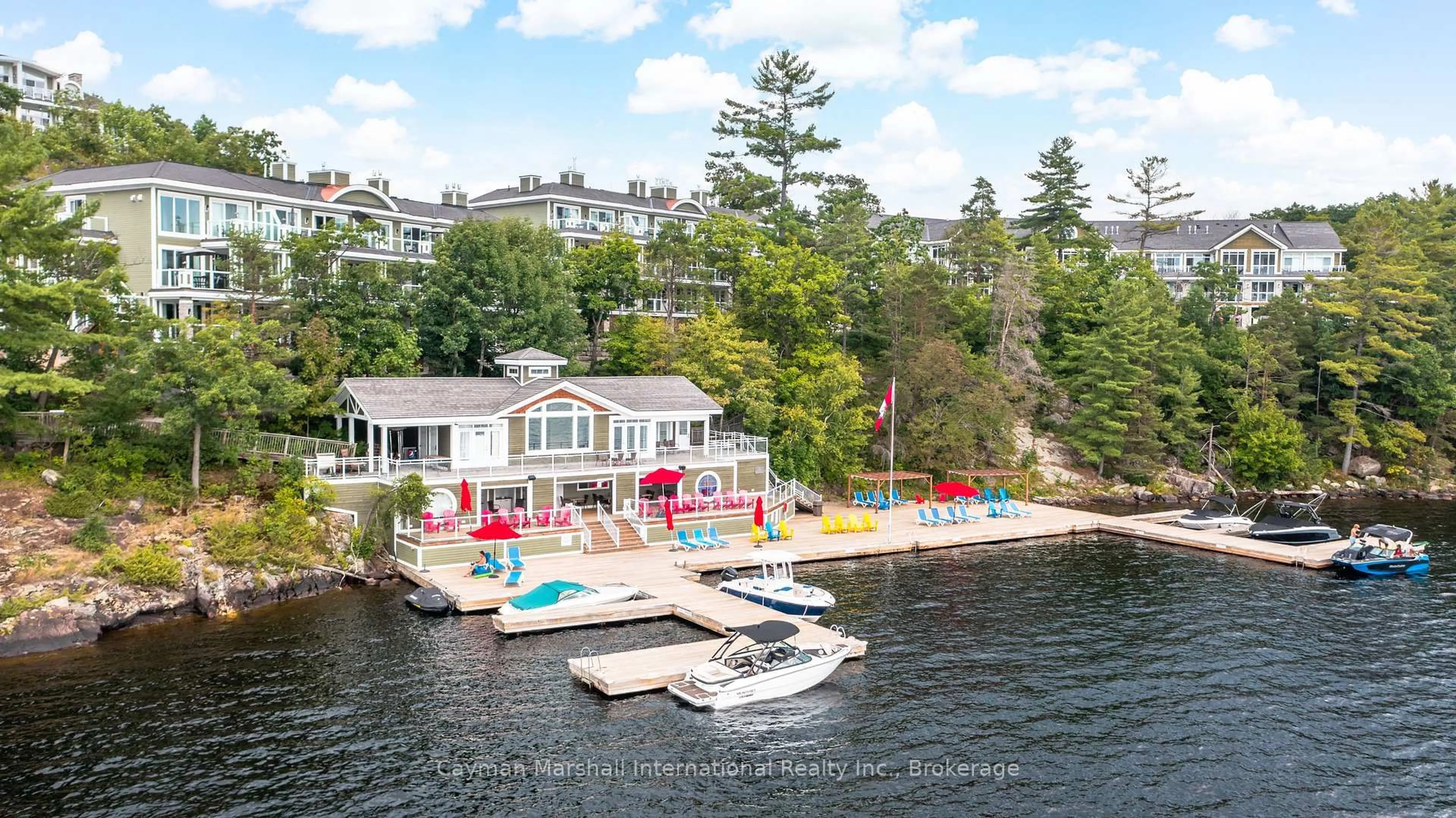 A pic from outside/outdoor area/front of a property/back of a property/a pic from drone, water/lake/river/ocean view for 1869 Muskoka Road HWY 118 #BTV-E106, Muskoka Lakes Ontario P1L 1W8