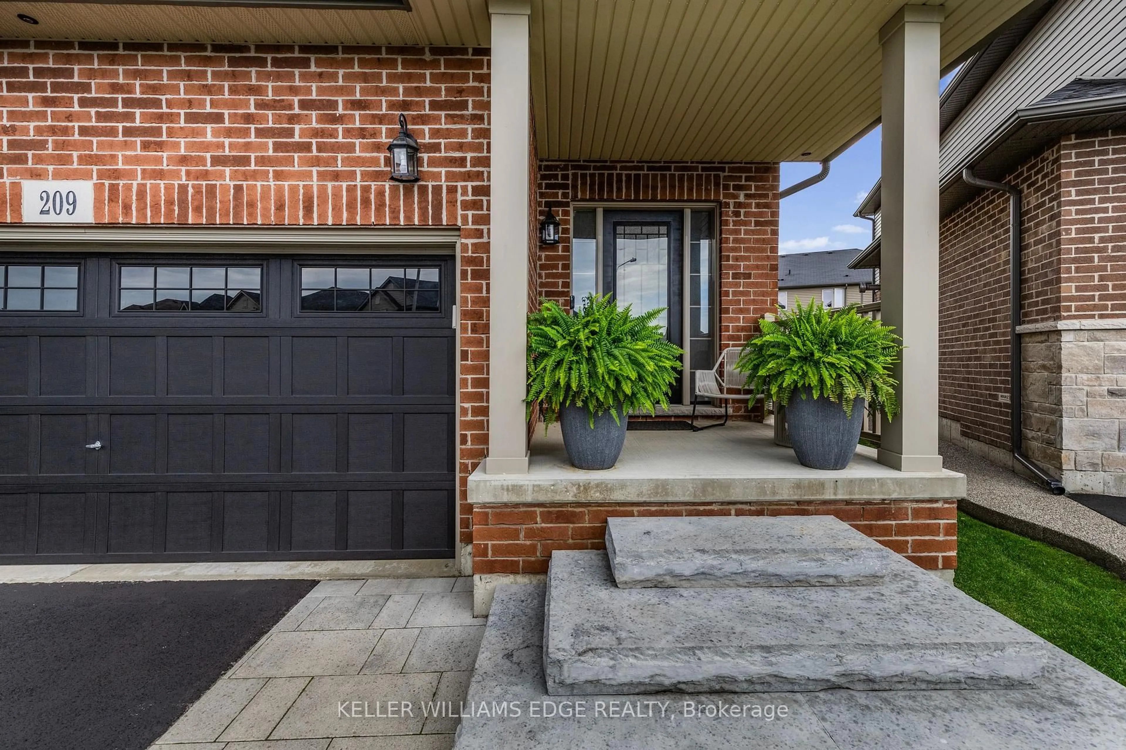 Home with brick exterior material, street for 209 Echovalley Dr, Hamilton Ontario L8J 0H1