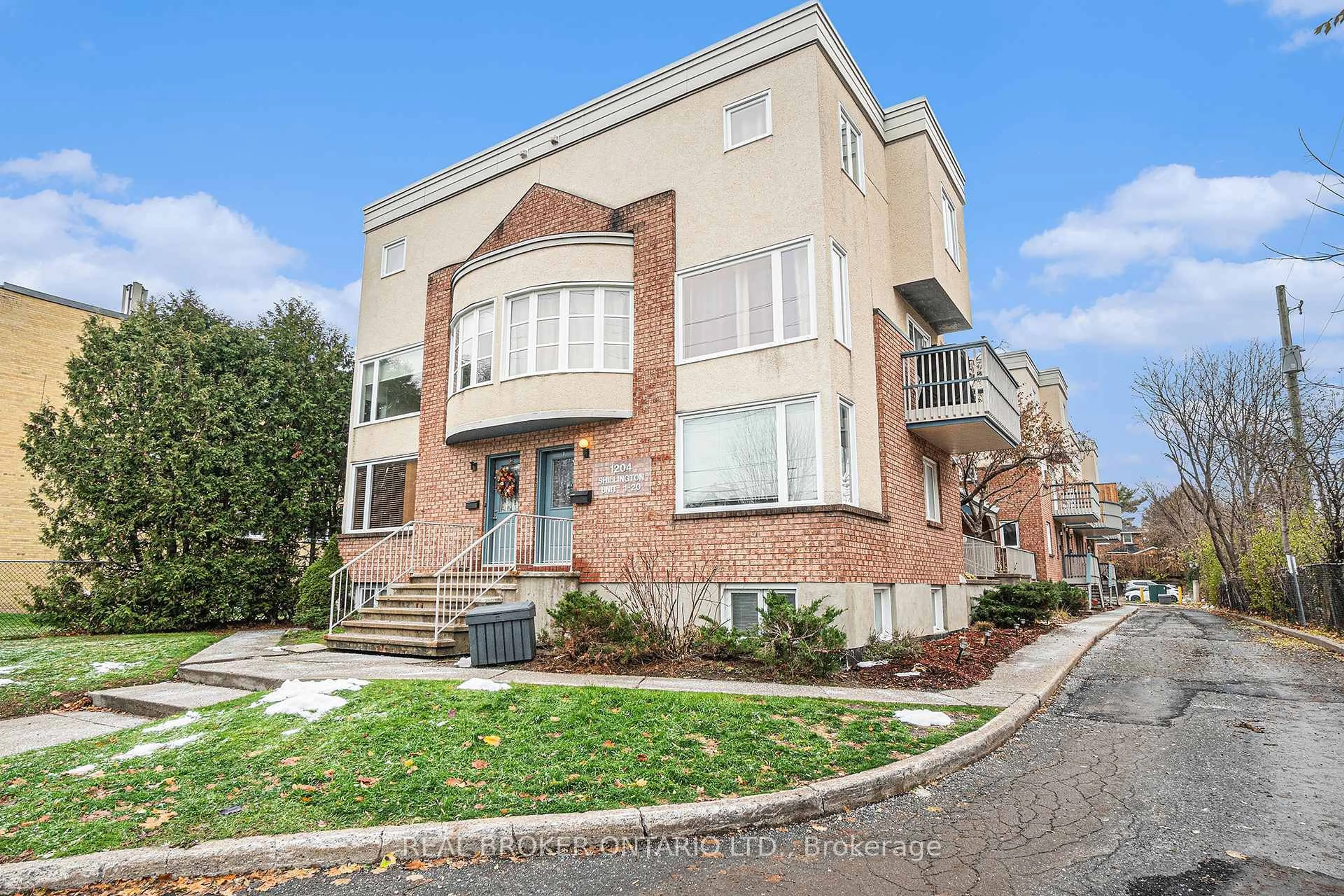 Home with brick exterior material, street for 1204 Shillington Ave #5, Ottawa Ontario K1Z 7Z4