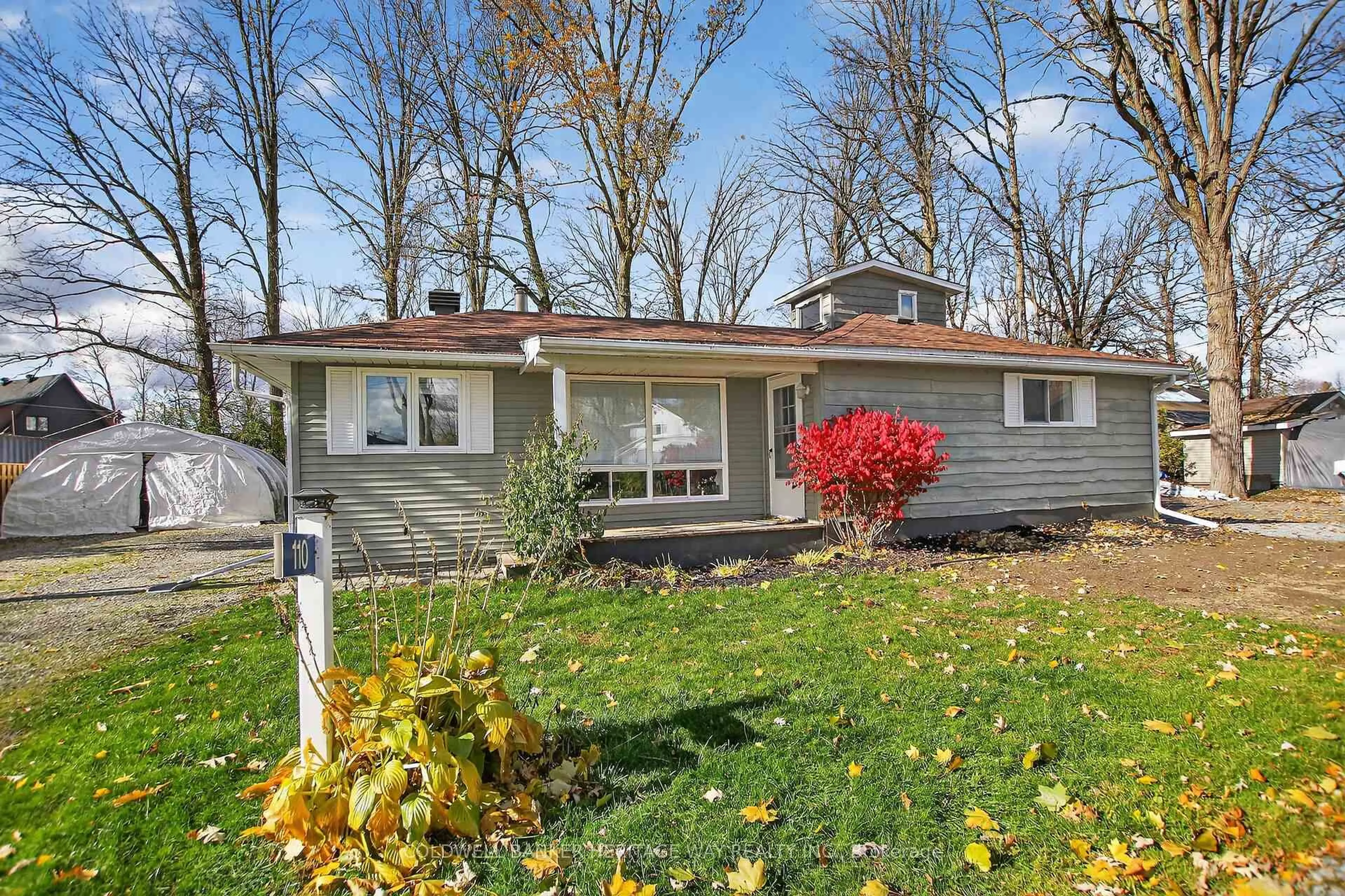 Home with vinyl exterior material, street for 110 Elm Ave, Carleton Place Ontario K7C 0C4