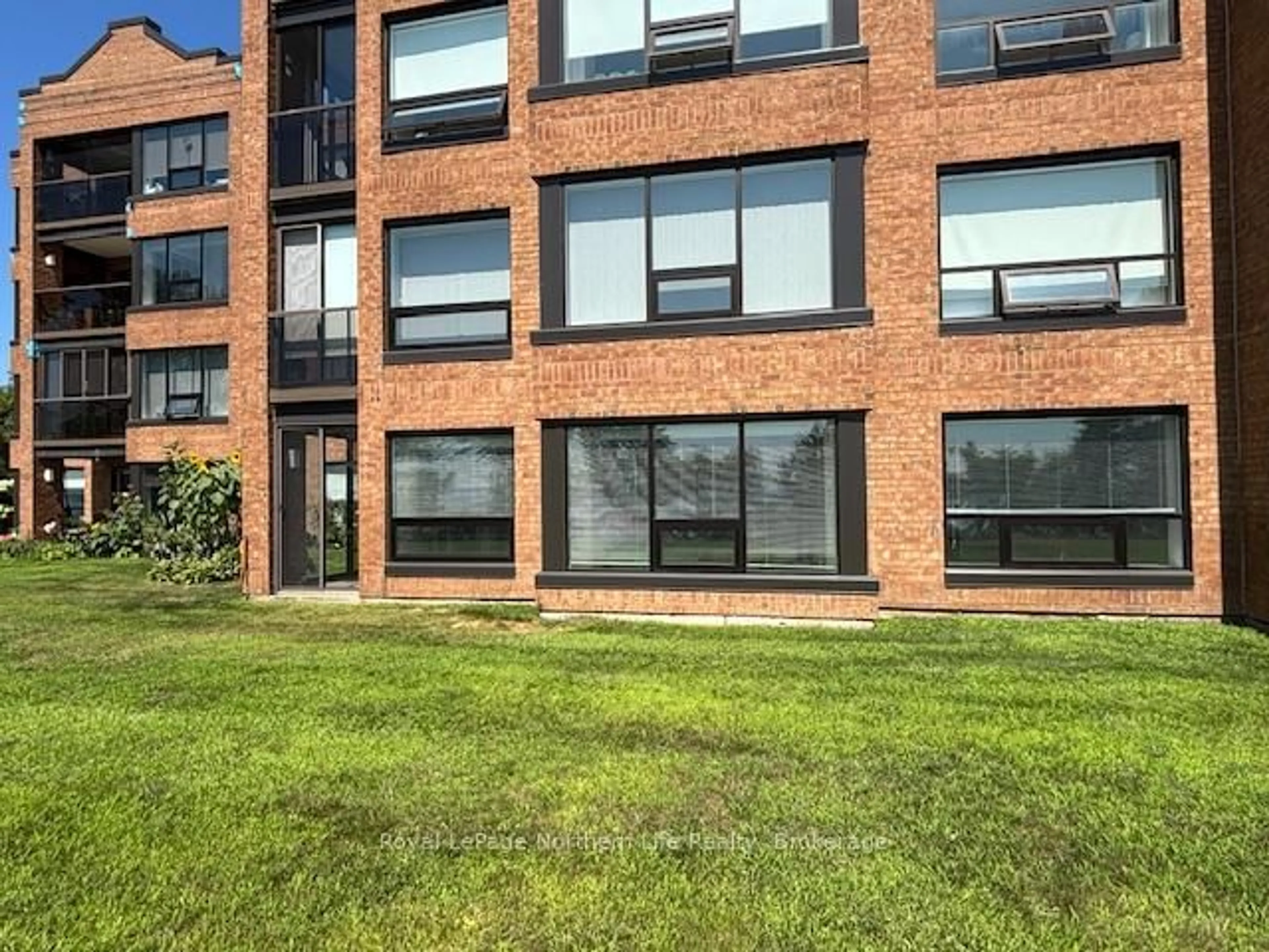 A pic from outside/outdoor area/front of a property/back of a property/a pic from drone, building for 155 Timmins St #114, North Bay Ontario P1B 9K8