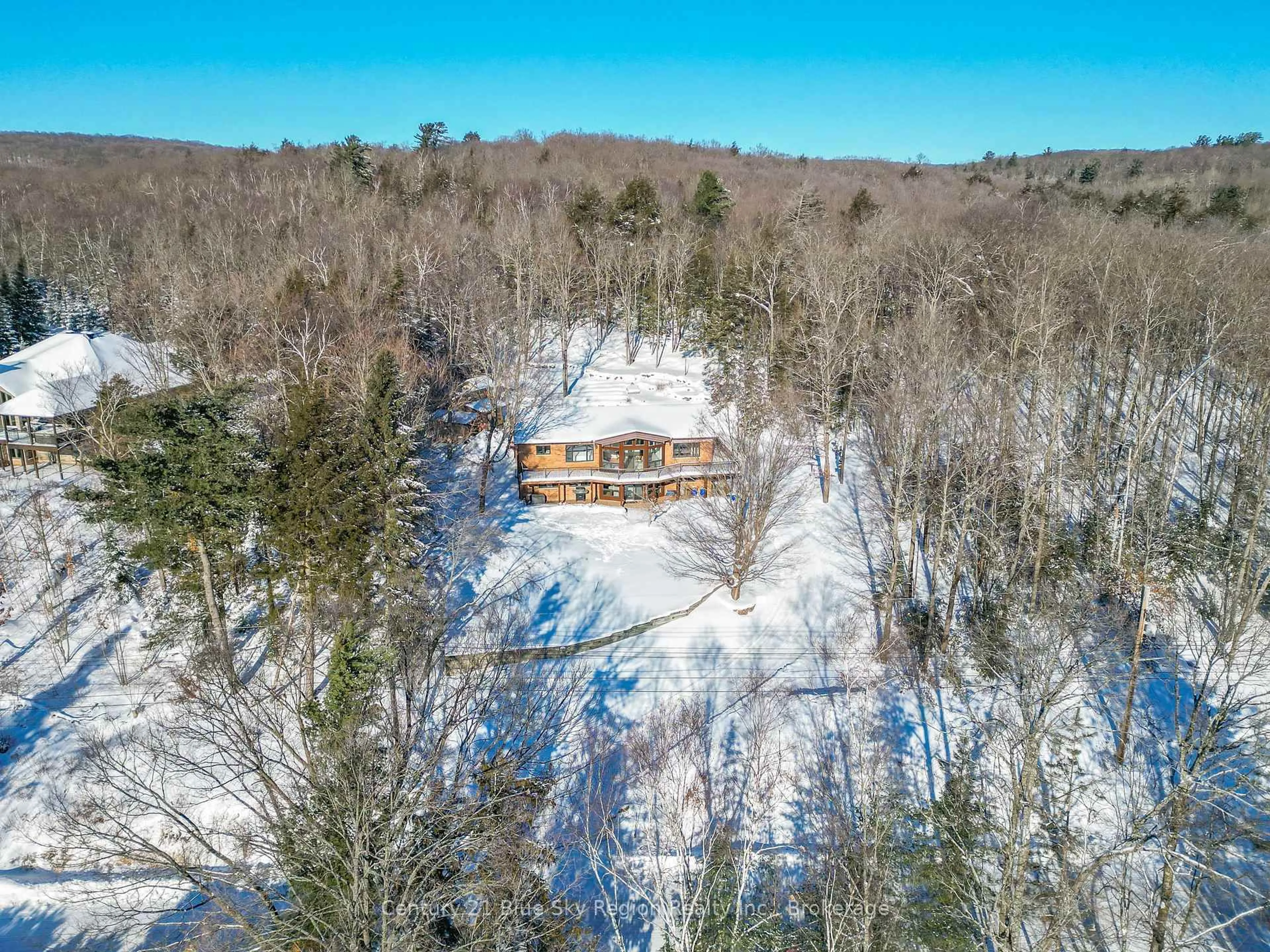 A pic from outside/outdoor area/front of a property/back of a property/a pic from drone, forest/trees view for 708 Anita Ave, North Bay Ontario P1B 8G4