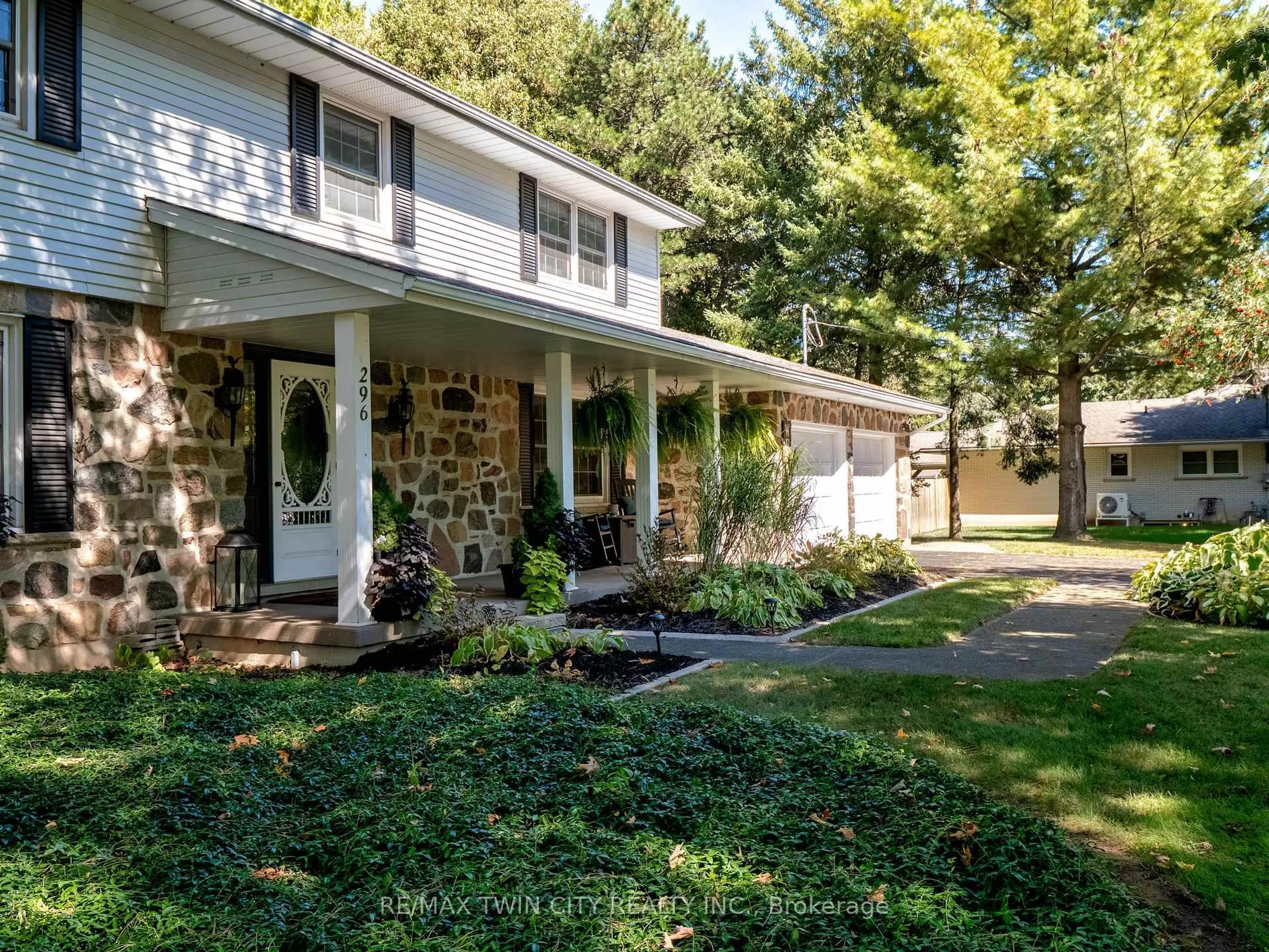 Home with vinyl exterior material, street for 296 Edgehill Dr, Kitchener Ontario N2P 2C9