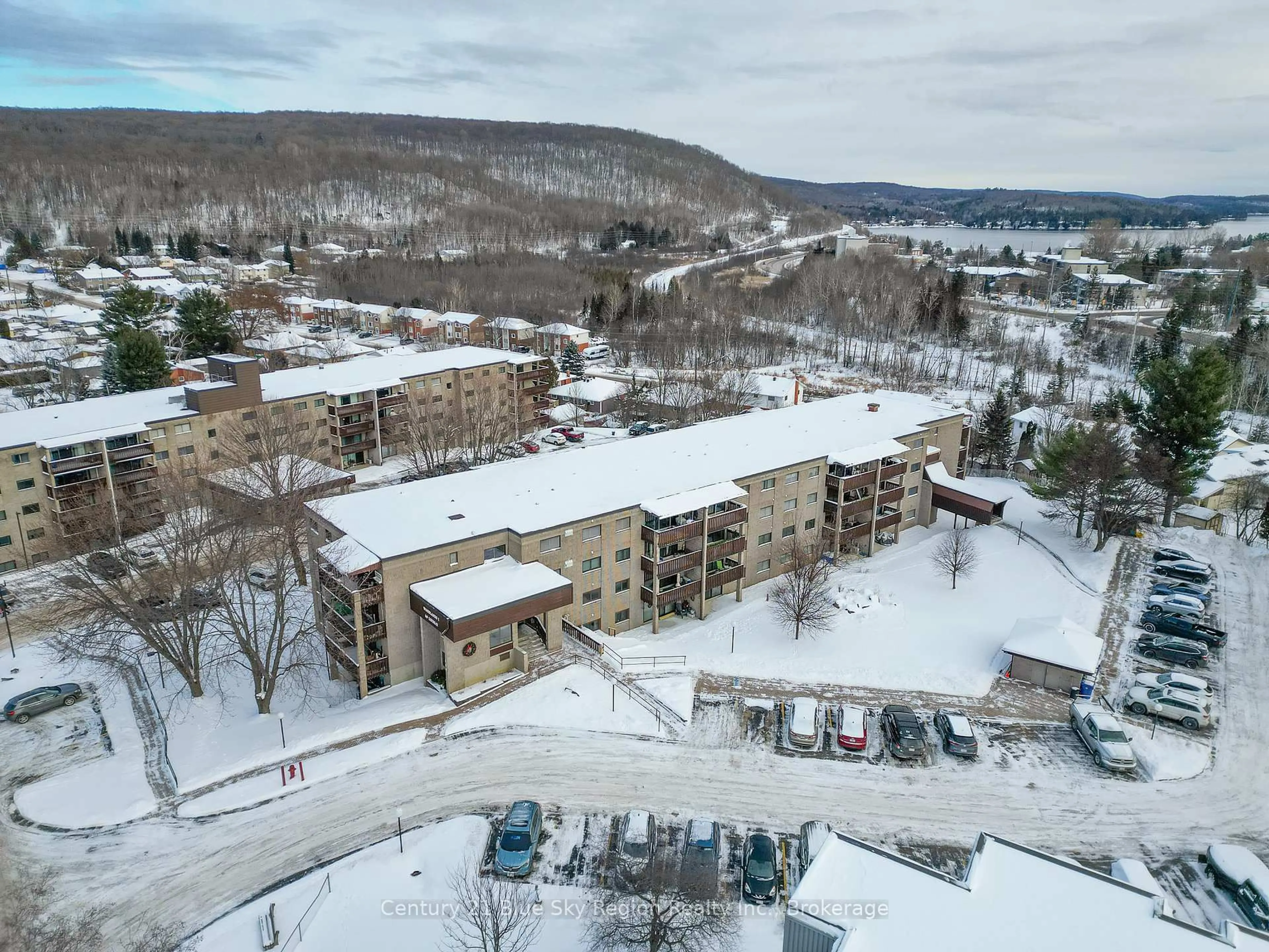 A pic from outside/outdoor area/front of a property/back of a property/a pic from drone, mountain view for 149 Lindsay St #202, North Bay Ontario P1B 7Z1
