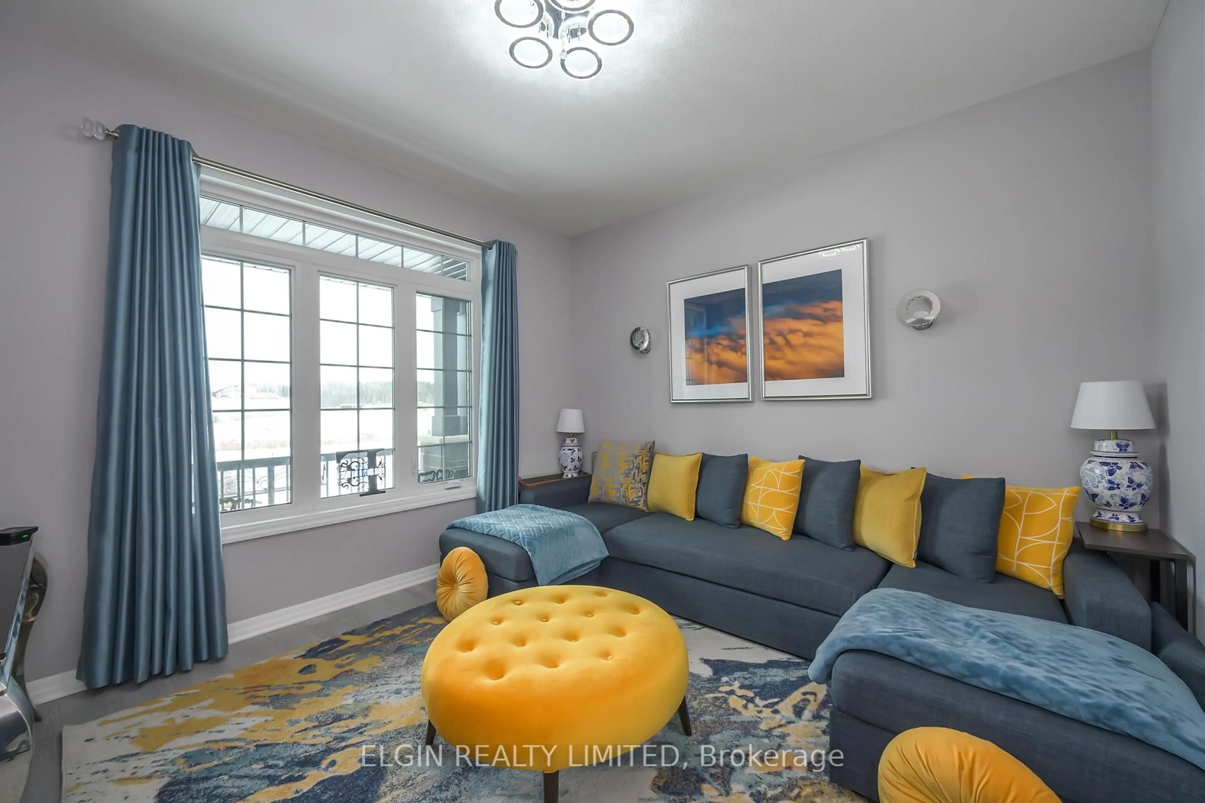 Living room with furniture, unknown for 48 Snowy Owl Tr, Central Elgin Ontario N5R 0M7