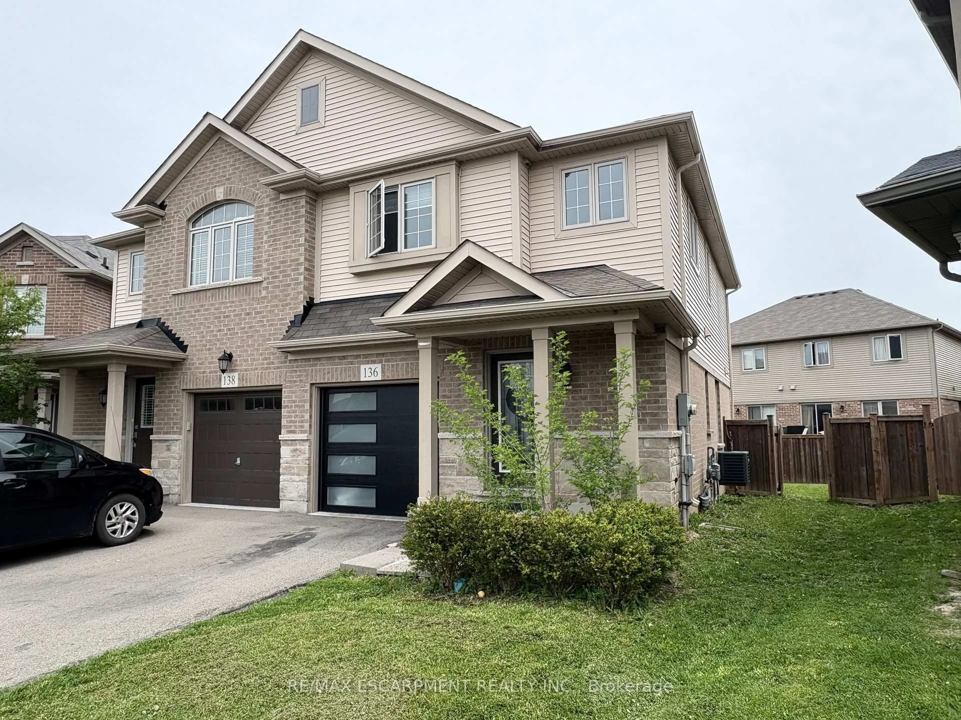 Home with brick exterior material, street for 136 Westbank Tr, Hamilton Ontario L8J 1R5