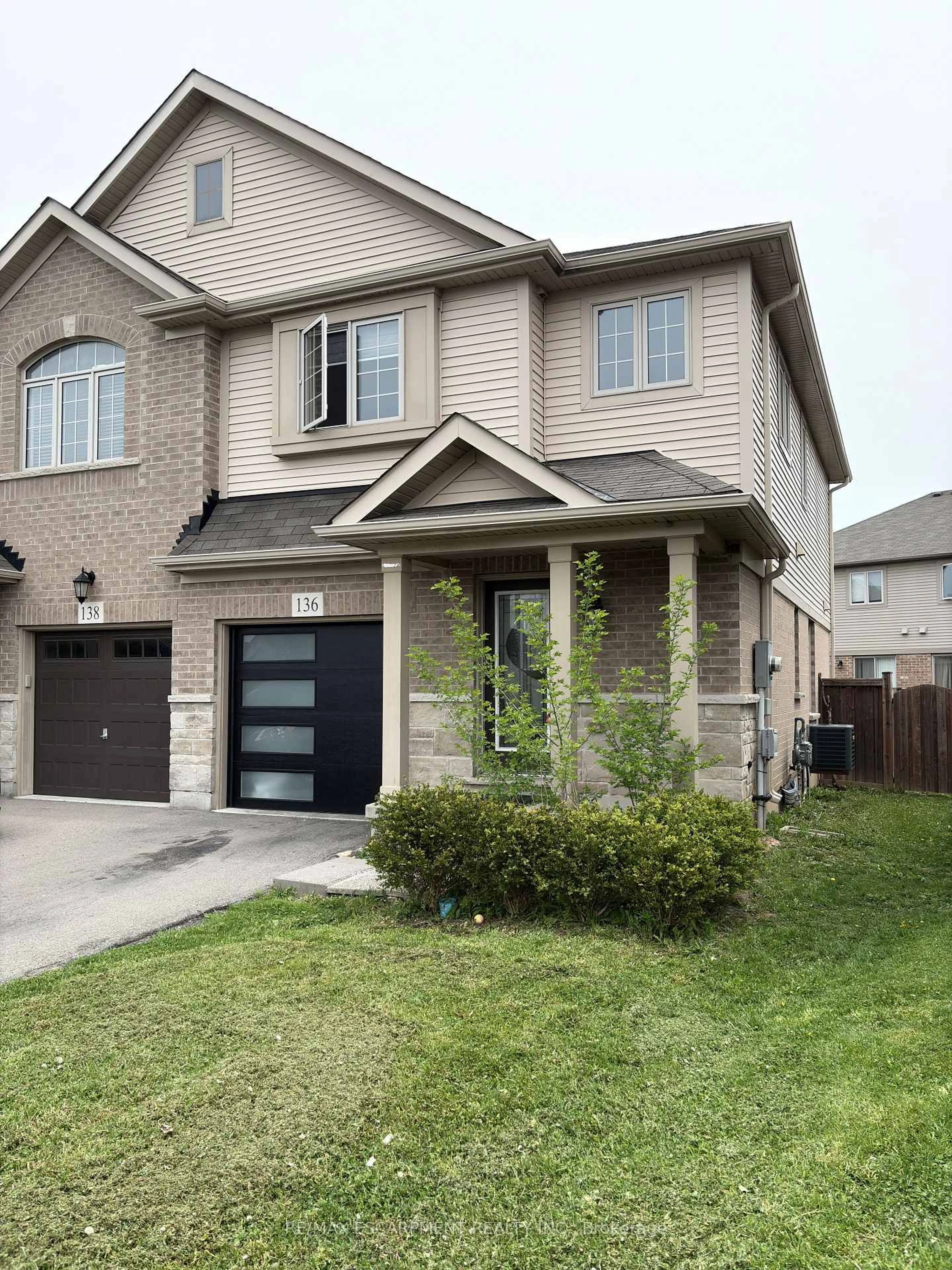 Home with brick exterior material, street for 136 Westbank Tr, Hamilton Ontario L8J 1R5