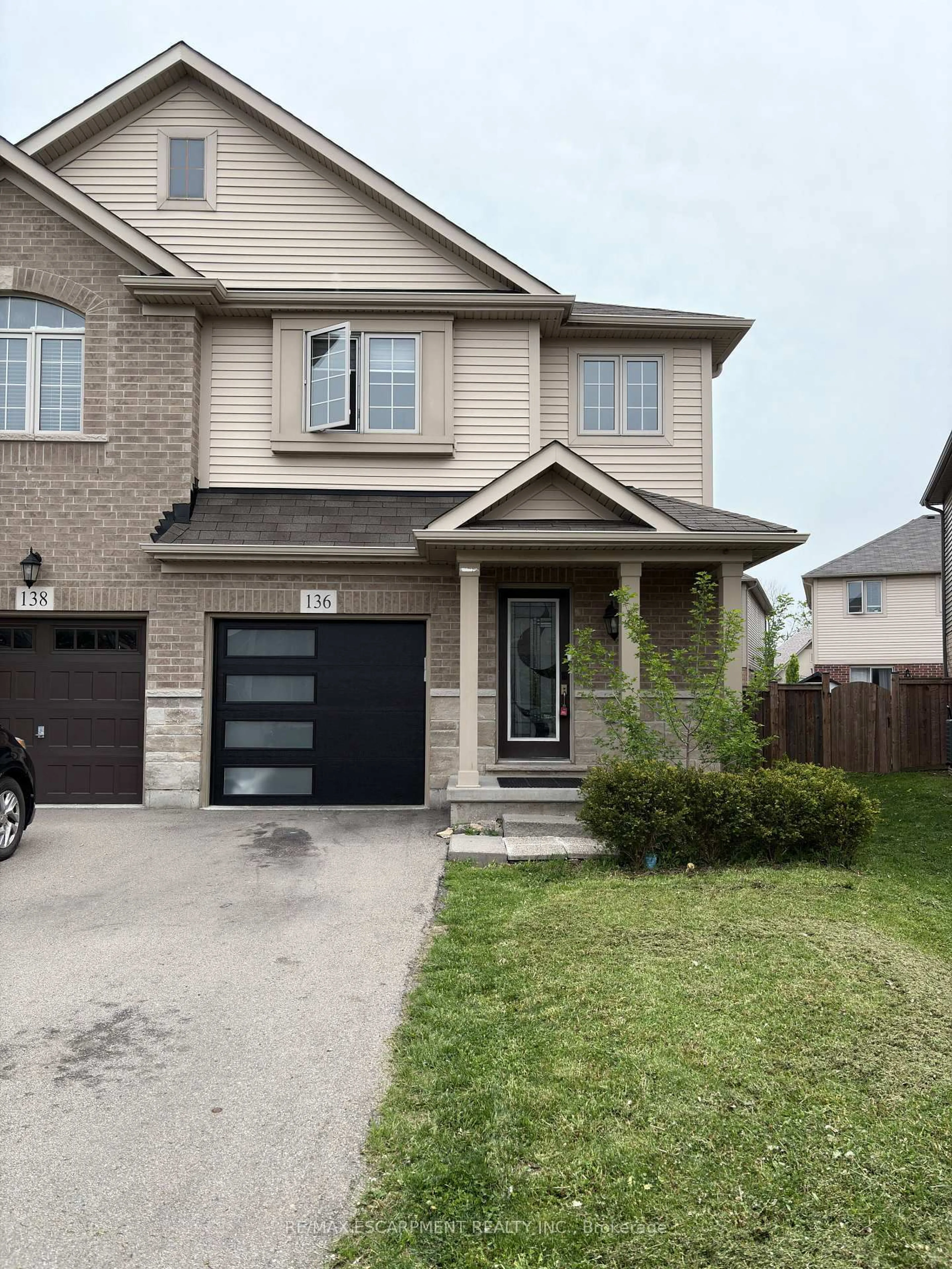 Home with brick exterior material, street for 136 Westbank Tr, Hamilton Ontario L8J 1R5