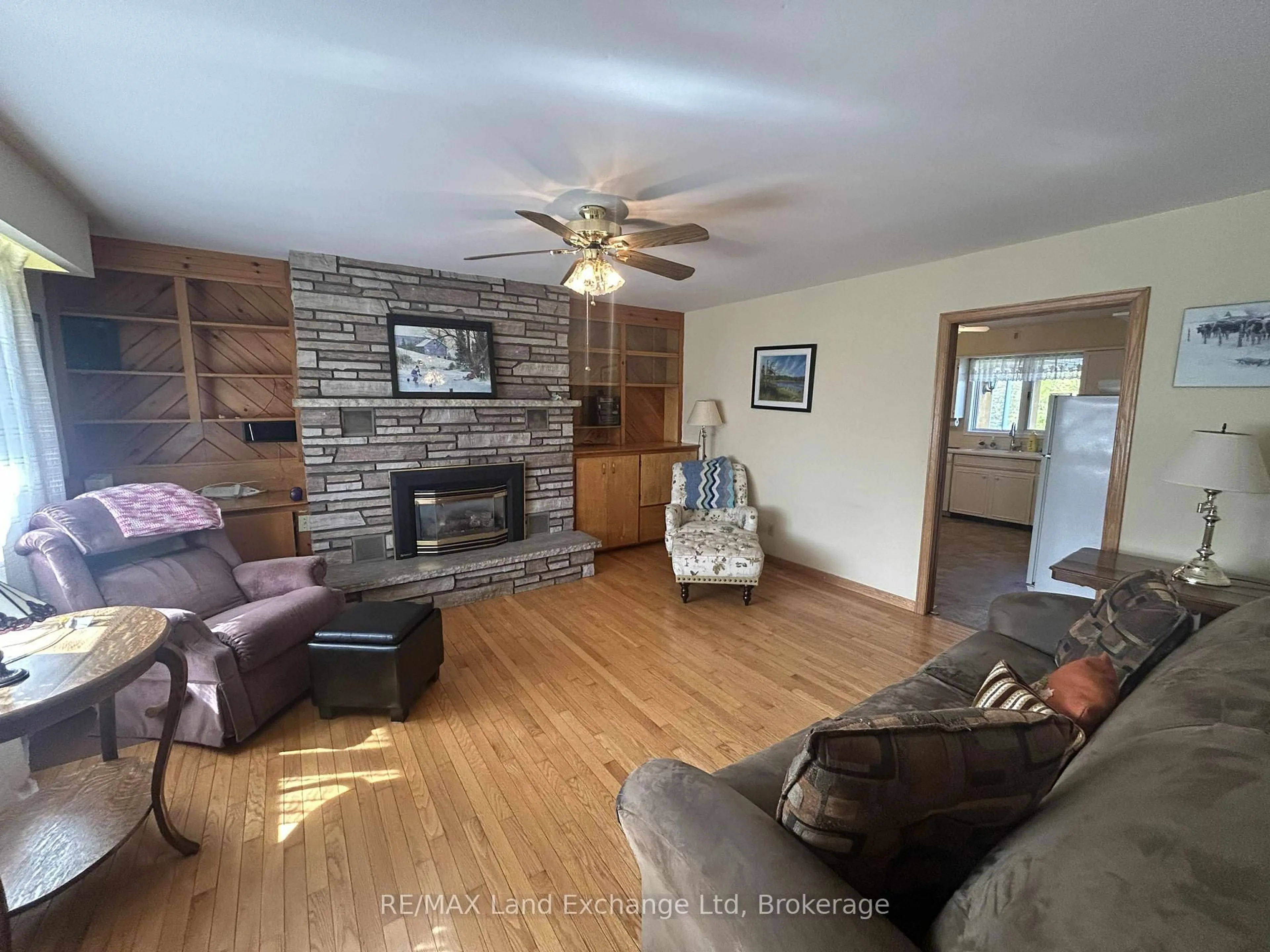 Living room with furniture, wood/laminate floor for 38 Hillcrest St, South Bruce Ontario N0G 2S0