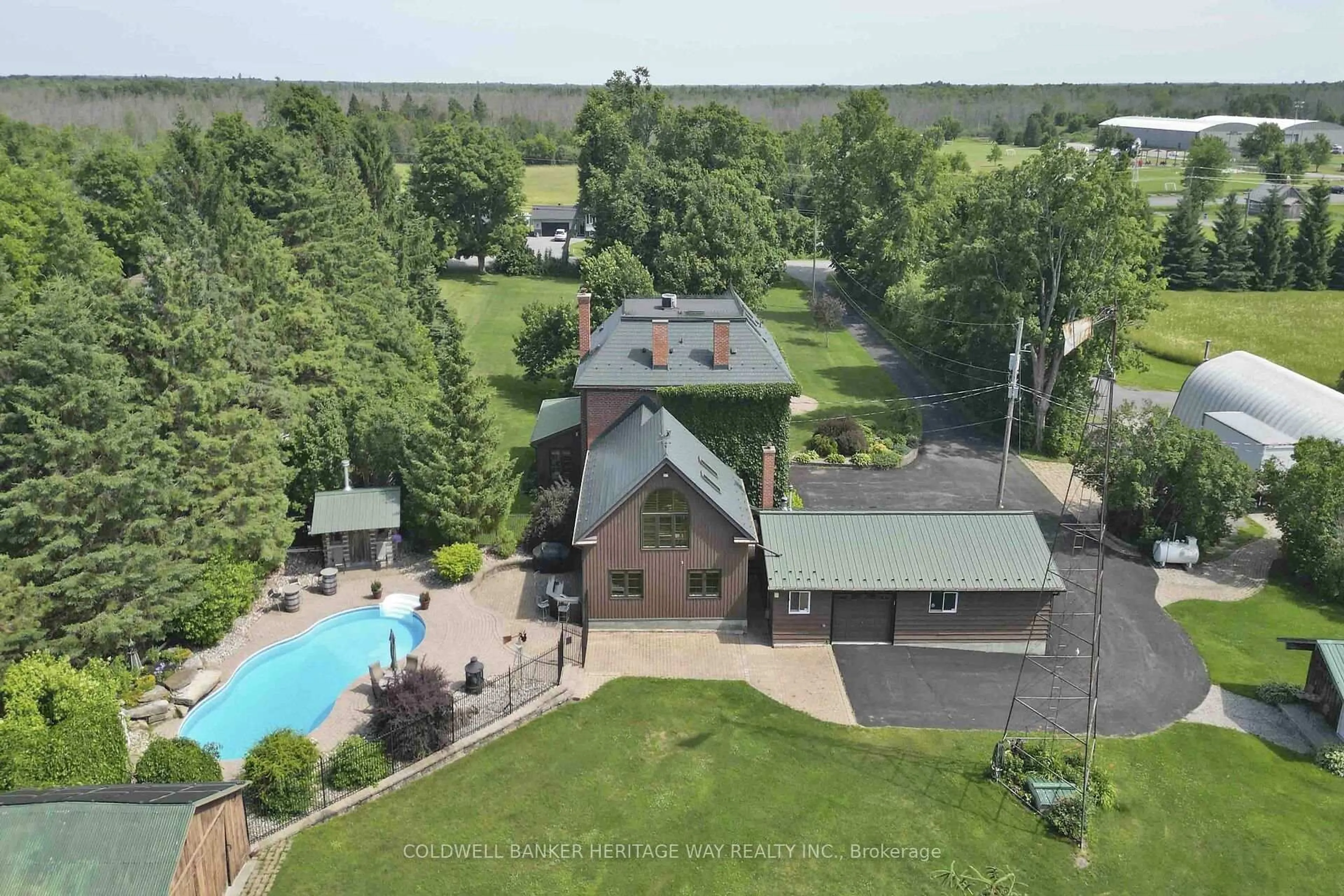 A pic from outside/outdoor area/front of a property/back of a property/a pic from drone, water/lake/river/ocean view for 1276 9th Line, Carleton Place Ontario K7C 0V9