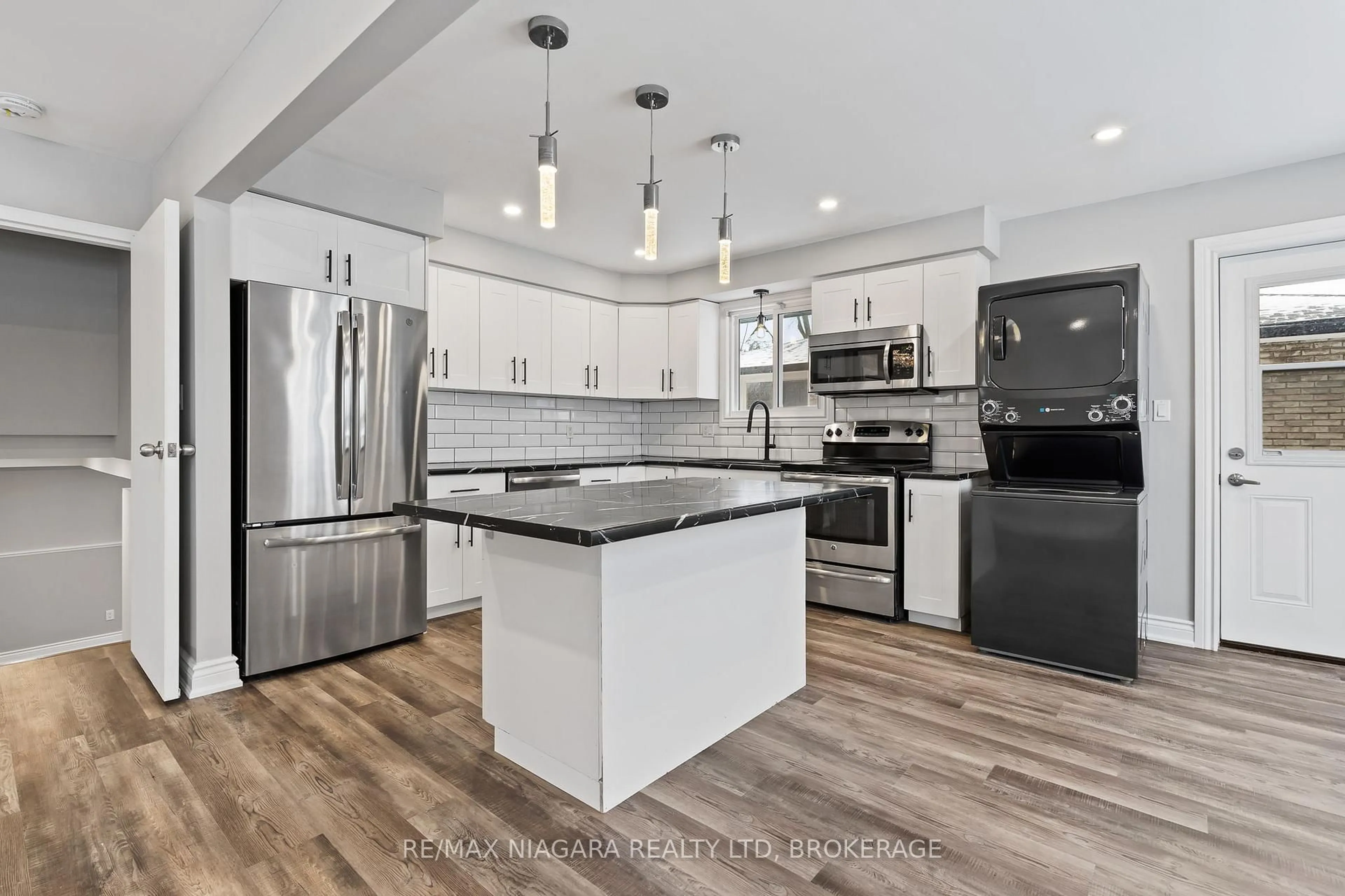 Open concept kitchen, unknown for 26 Colonial St, Welland Ontario L3C 5W5
