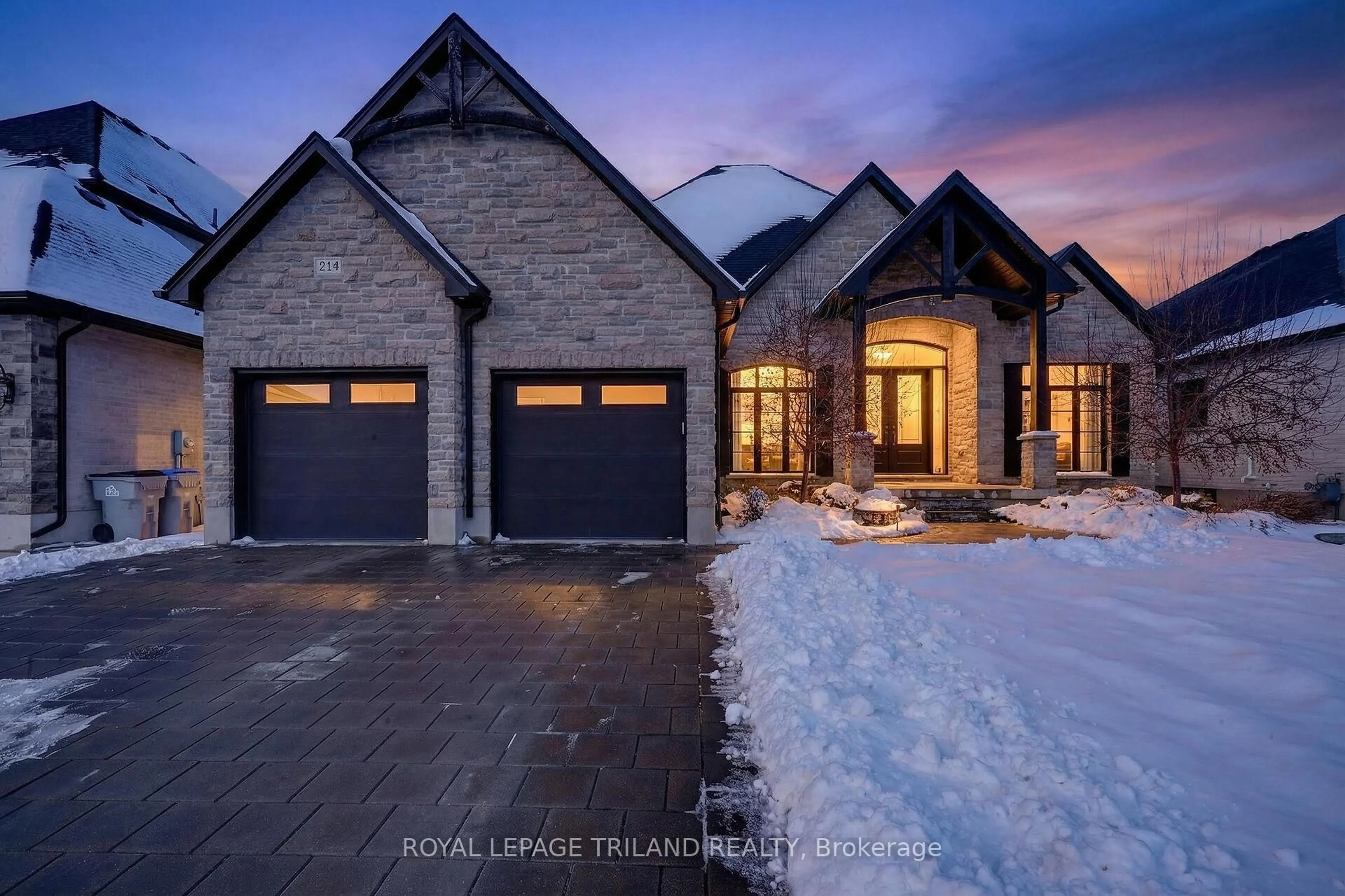 Home with brick exterior material, street for 9861 GLENDON Dr #218, Middlesex Centre Ontario N0L 1R0