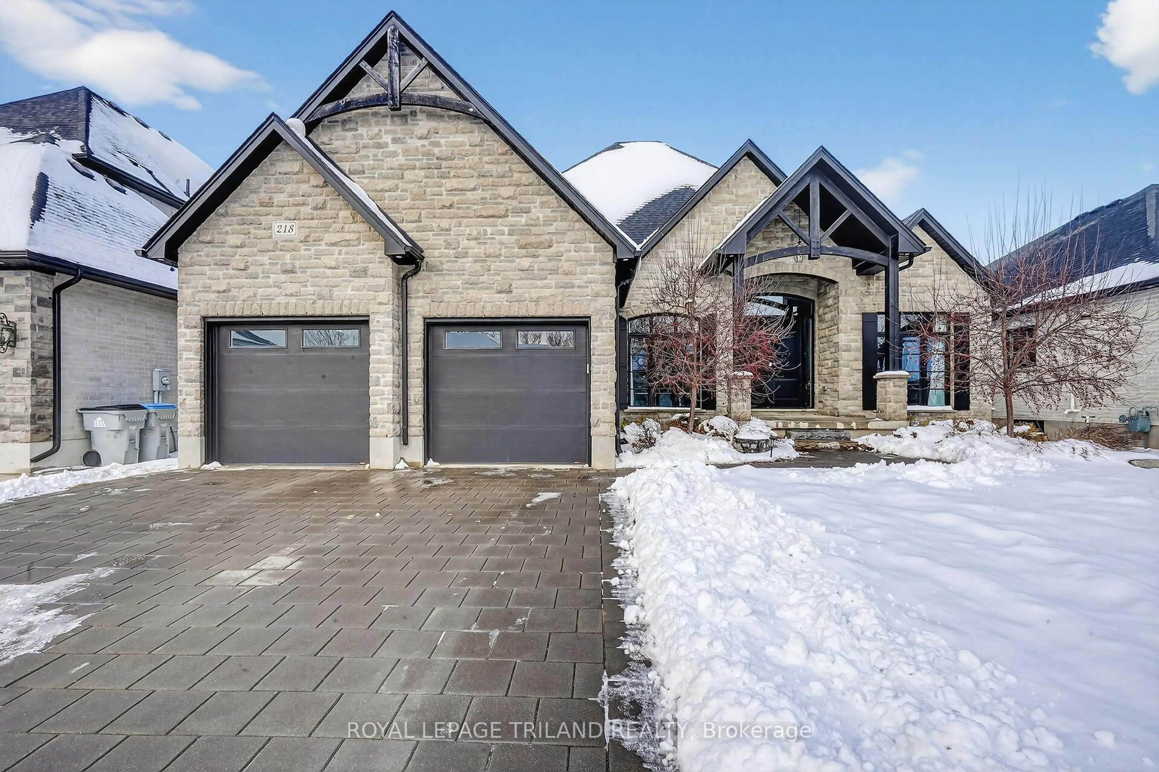 Home with brick exterior material, street for 9861 GLENDON Dr #218, Middlesex Centre Ontario N0L 1R0