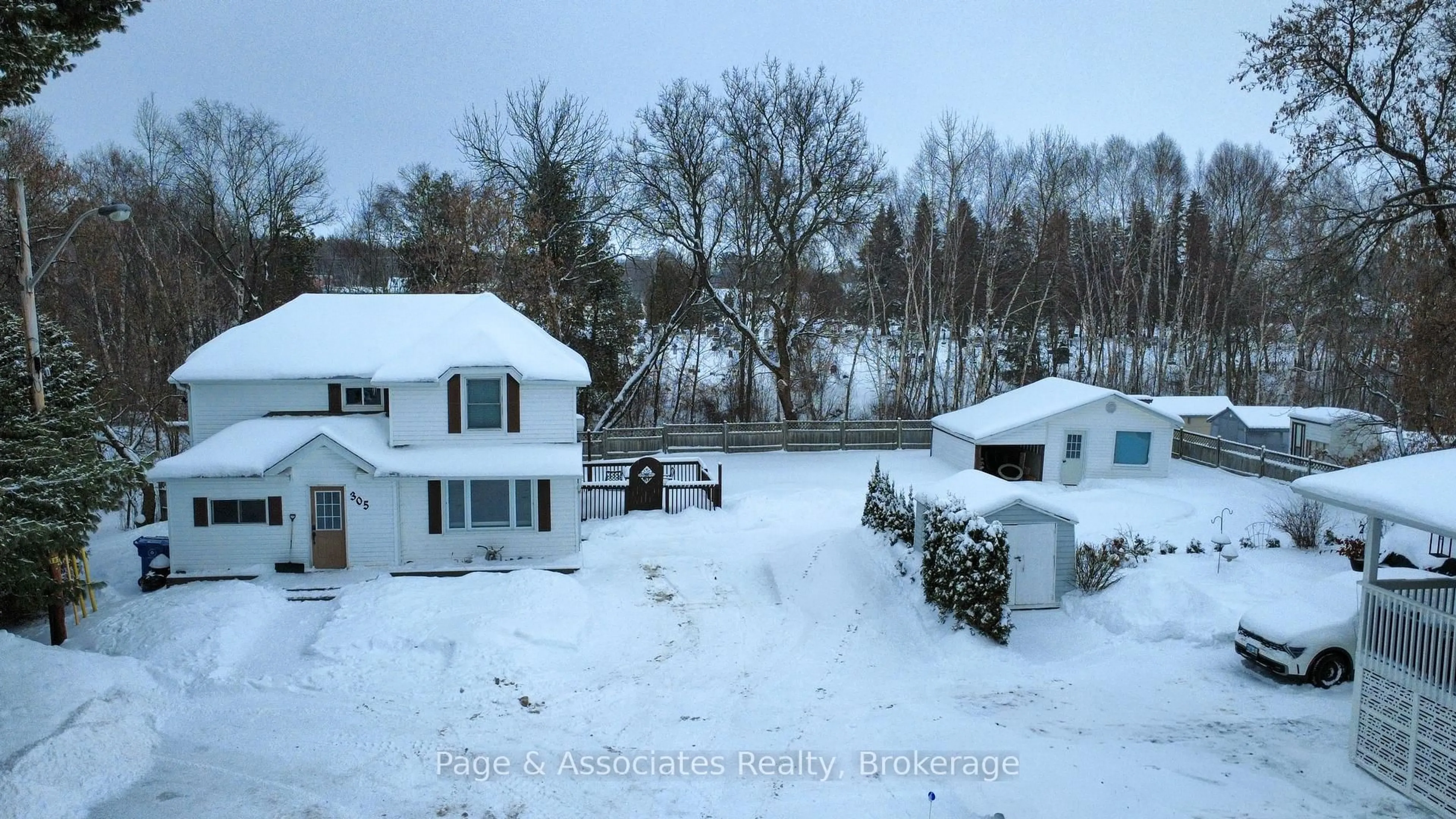 A pic from outside/outdoor area/front of a property/back of a property/a pic from drone, unknown for 305 Lillie St, West Nipissing Ontario P2B 3B3