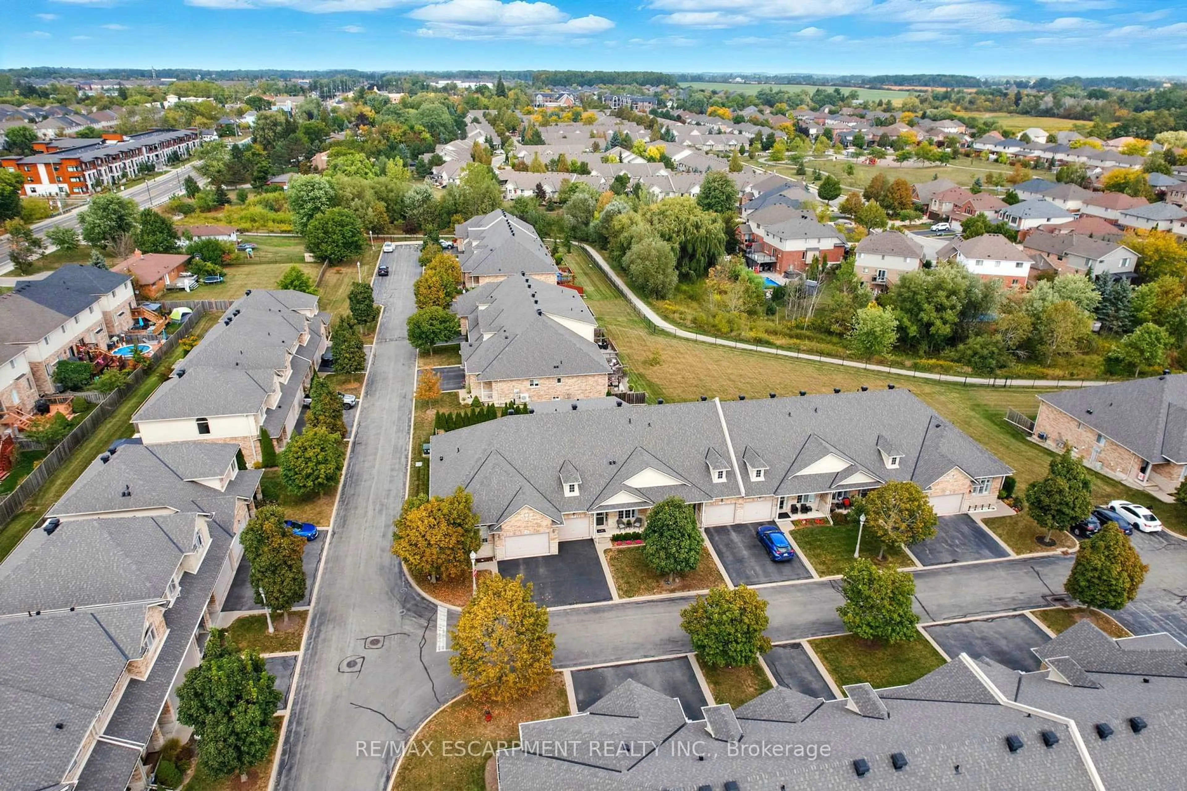 A pic from outside/outdoor area/front of a property/back of a property/a pic from drone, unknown for 310 Southbrook Dr #20, Hamilton Ontario L0R 1C0