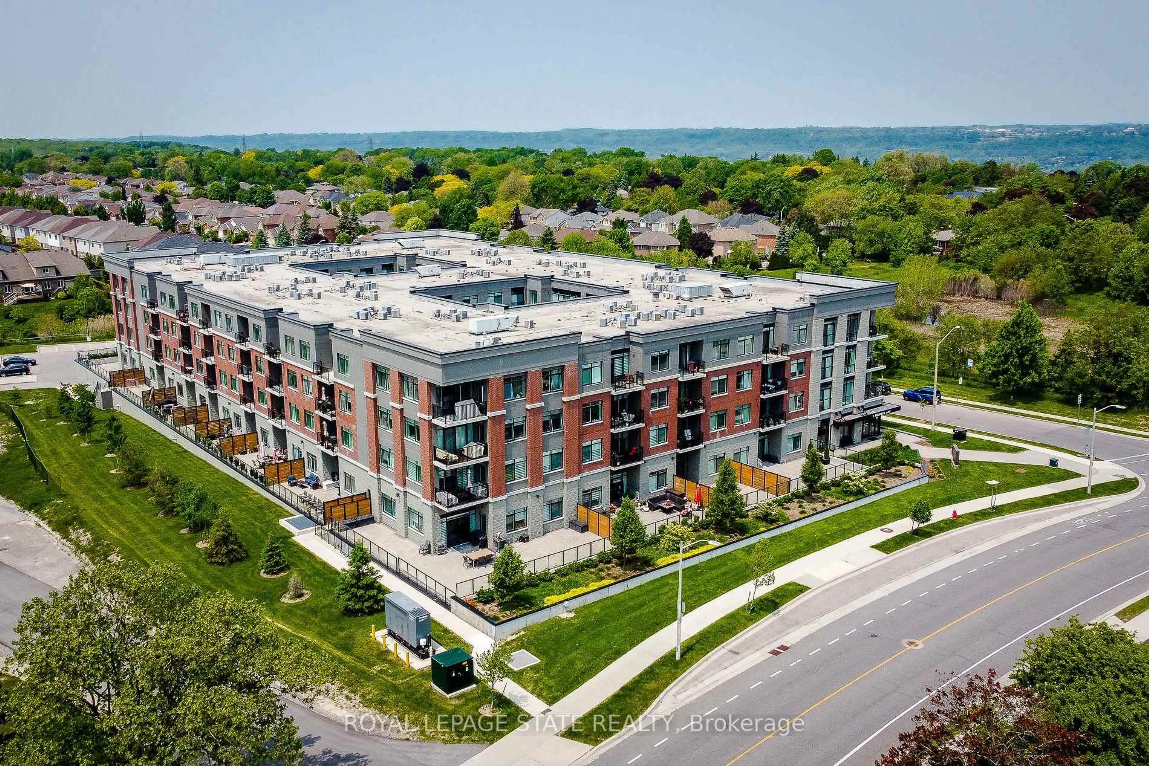 A pic from outside/outdoor area/front of a property/back of a property/a pic from drone, building for 1 Redfern Ave #313, Hamilton Ontario L9C 7S6