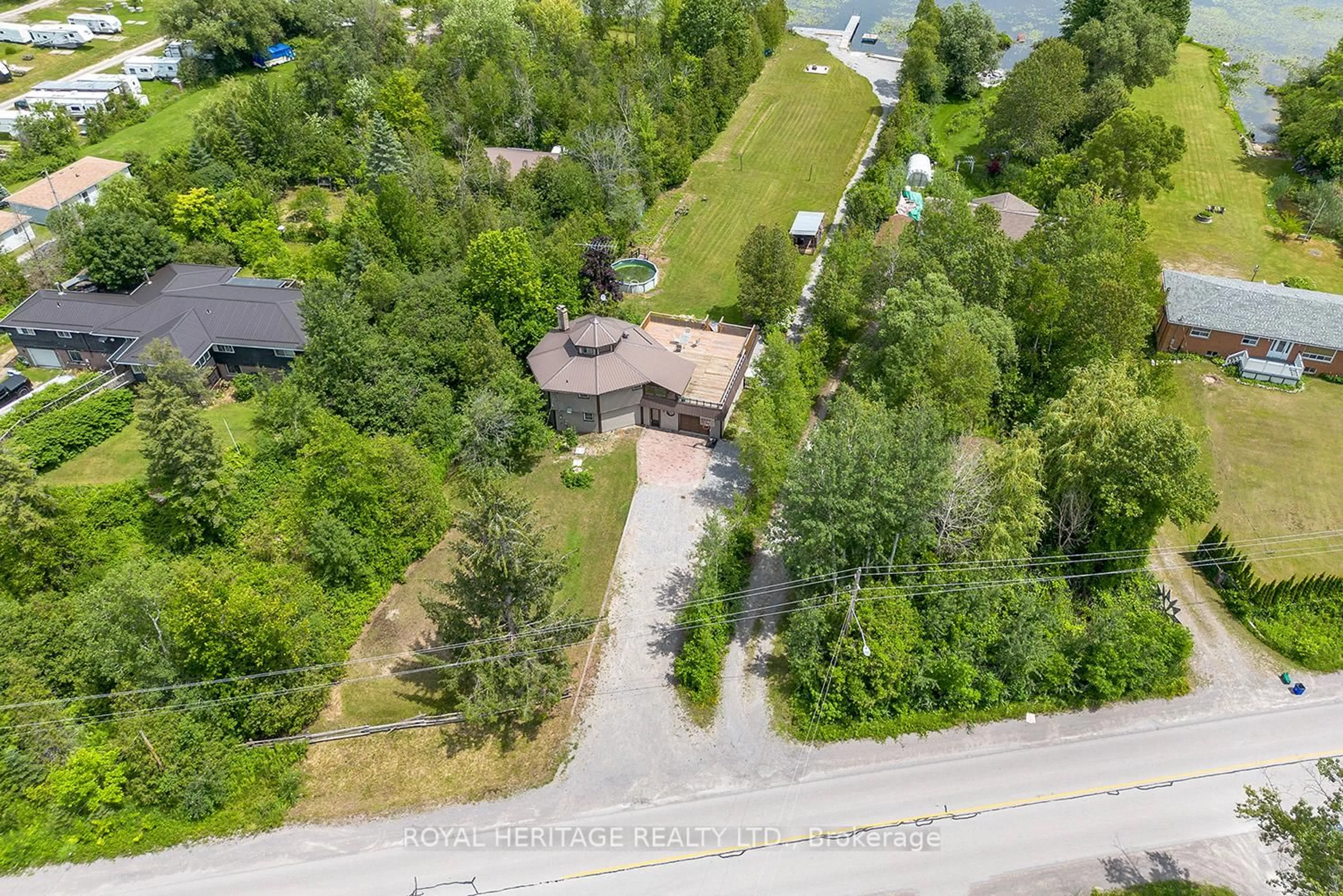 A pic from outside/outdoor area/front of a property/back of a property/a pic from drone, street for 5225 Rice Lake Dr, Hamilton Township Ontario K0L 1E0
