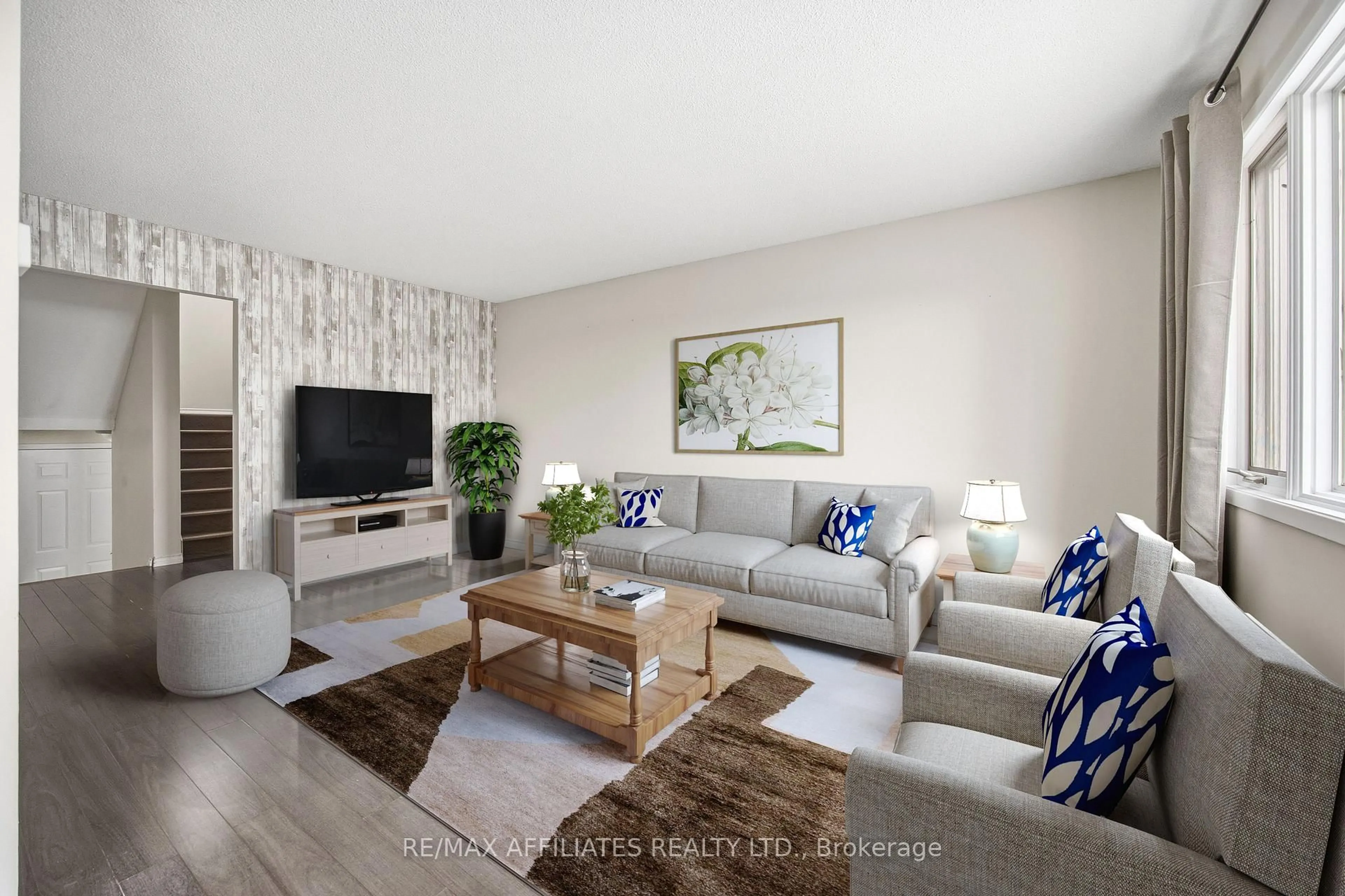 Living room with furniture, wood/laminate floor for 128 Dunham St, Carleton Place Ontario K7C 4M8