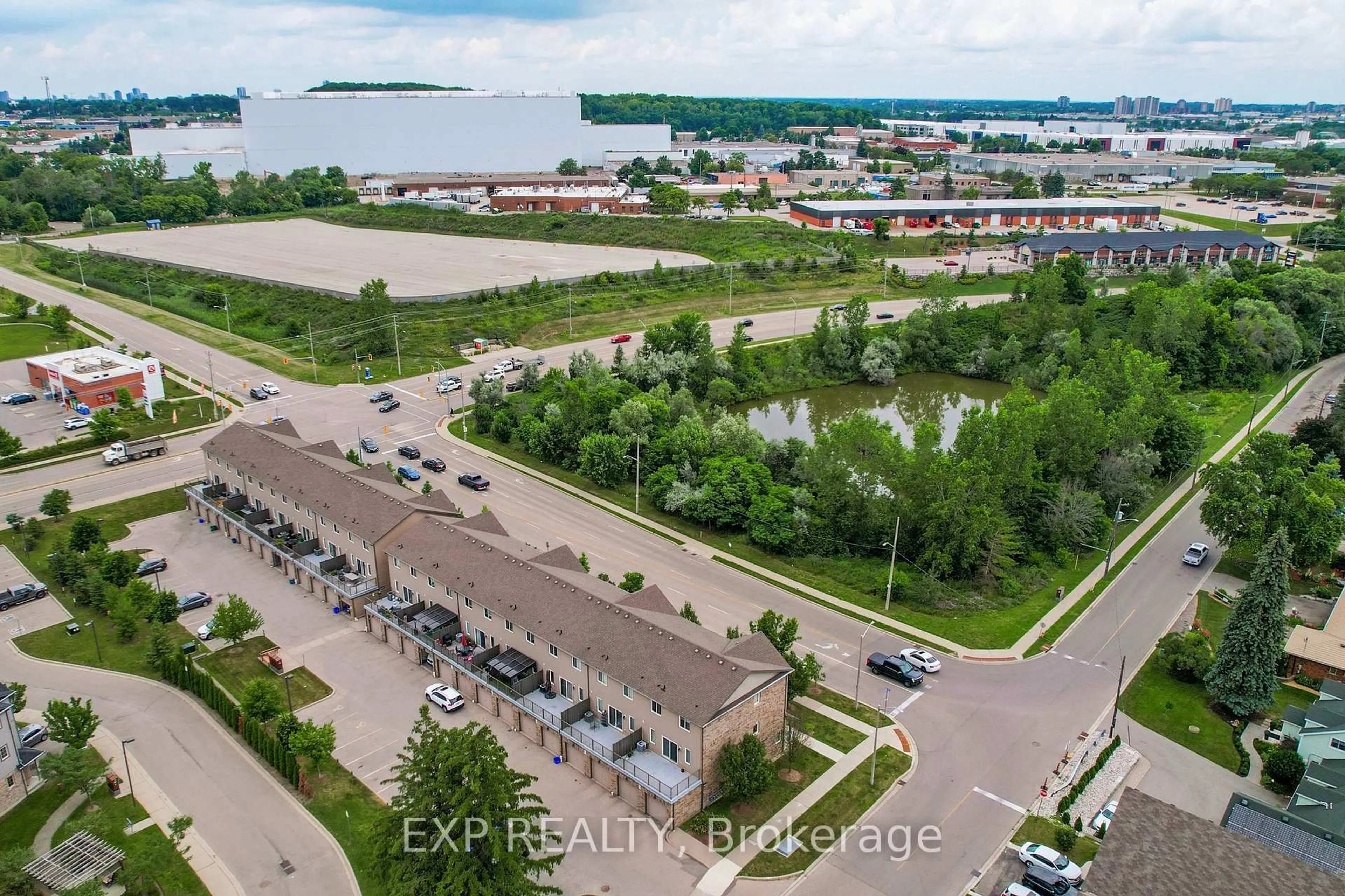 A pic from outside/outdoor area/front of a property/back of a property/a pic from drone, water/lake/river/ocean view for 275 Old Huron Rd #3, Kitchener Ontario N2R 1P9