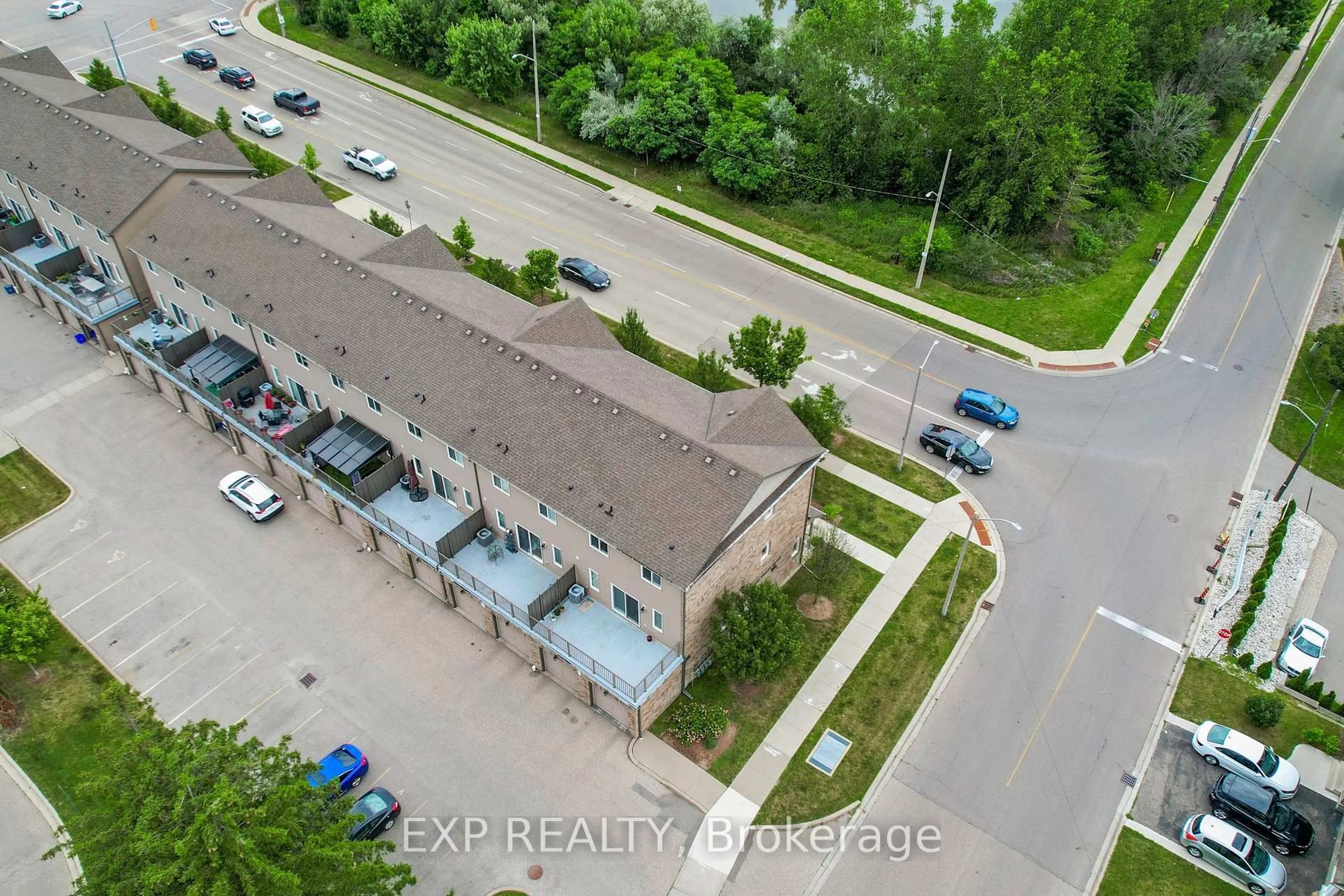 A pic from outside/outdoor area/front of a property/back of a property/a pic from drone, street for 275 Old Huron Rd #3, Kitchener Ontario N2R 1P9
