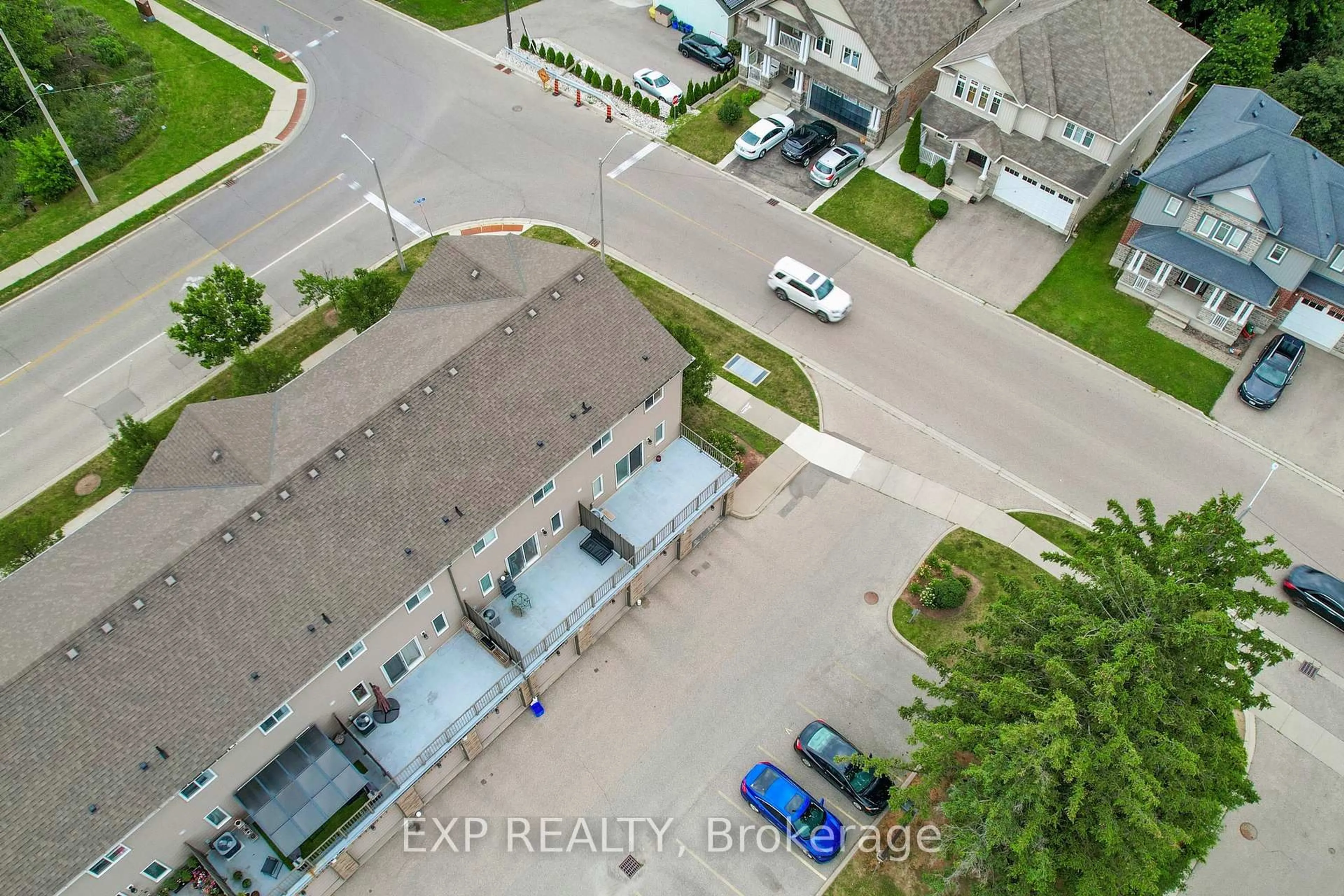 A pic from outside/outdoor area/front of a property/back of a property/a pic from drone, street for 275 Old Huron Rd #3, Kitchener Ontario N2R 1P9