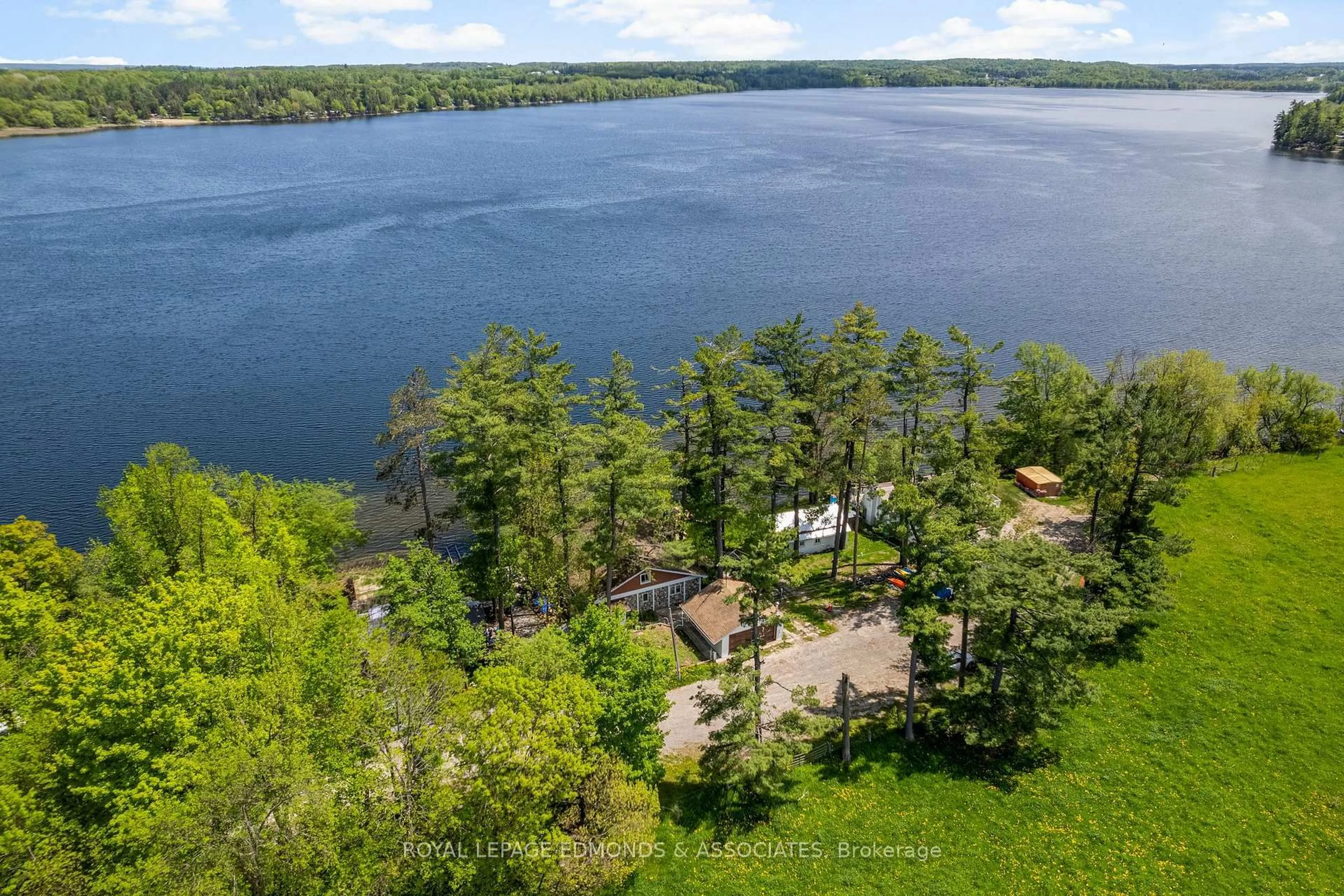 A pic from outside/outdoor area/front of a property/back of a property/a pic from drone, water/lake/river/ocean view for 87 Cobble Stone Lane, Cobden Ontario K0J 1K0
