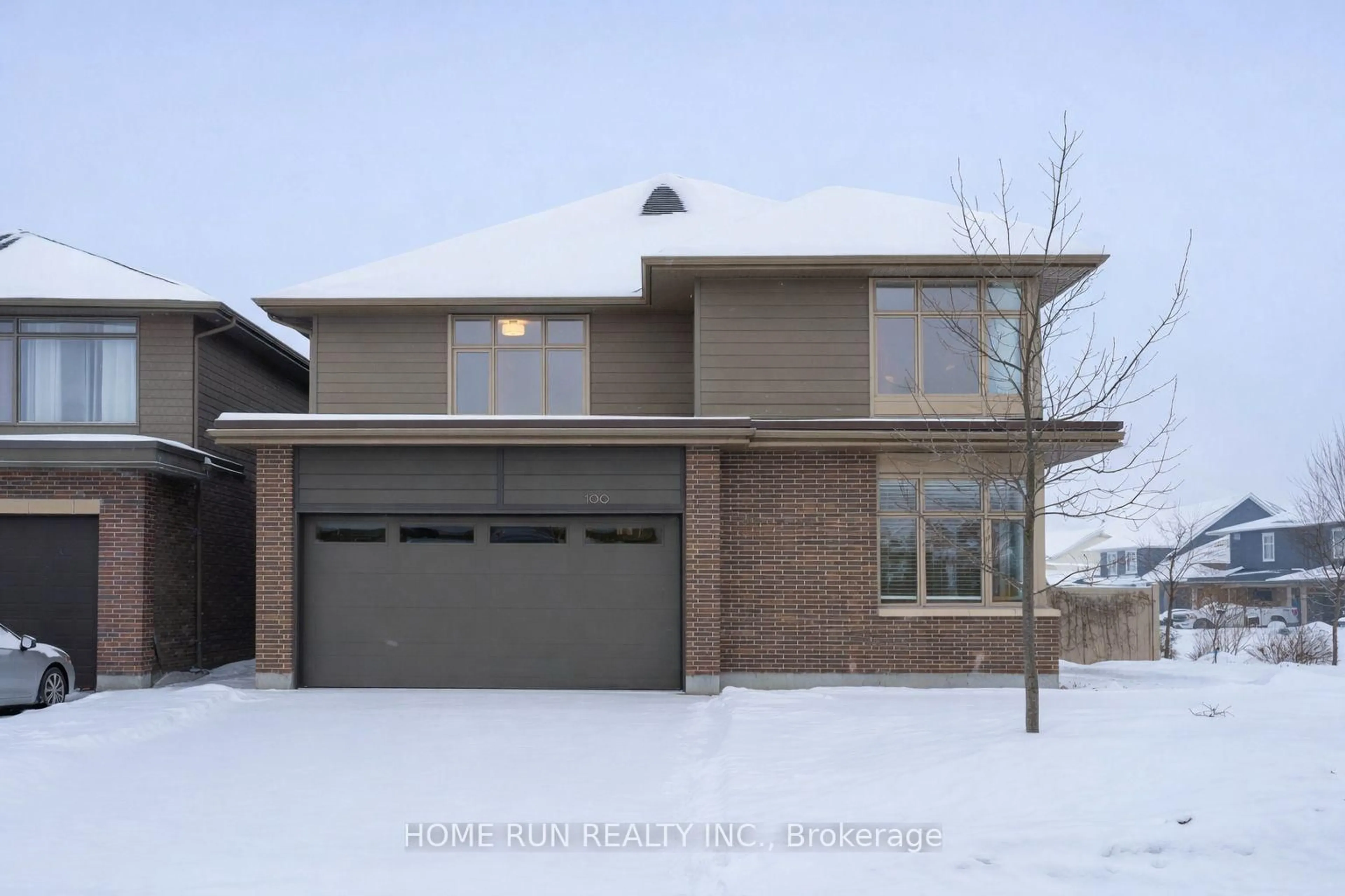 Home with brick exterior material, street for 100 Lochhouse Walk, Ottawa Ontario K2J 6A4