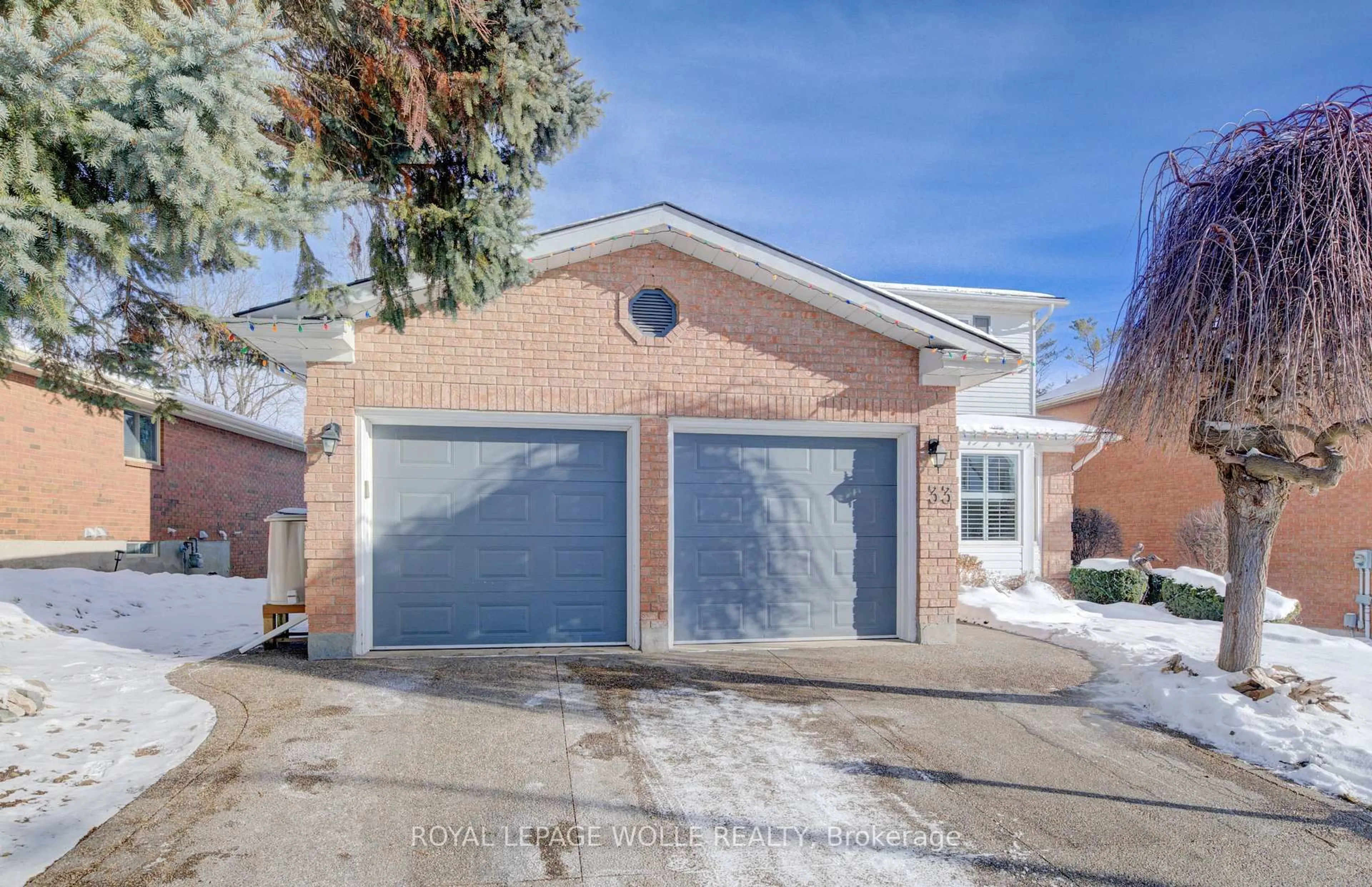 Home with brick exterior material, street for 33 Tinatawa Crt, Waterloo Ontario N2A 3G9