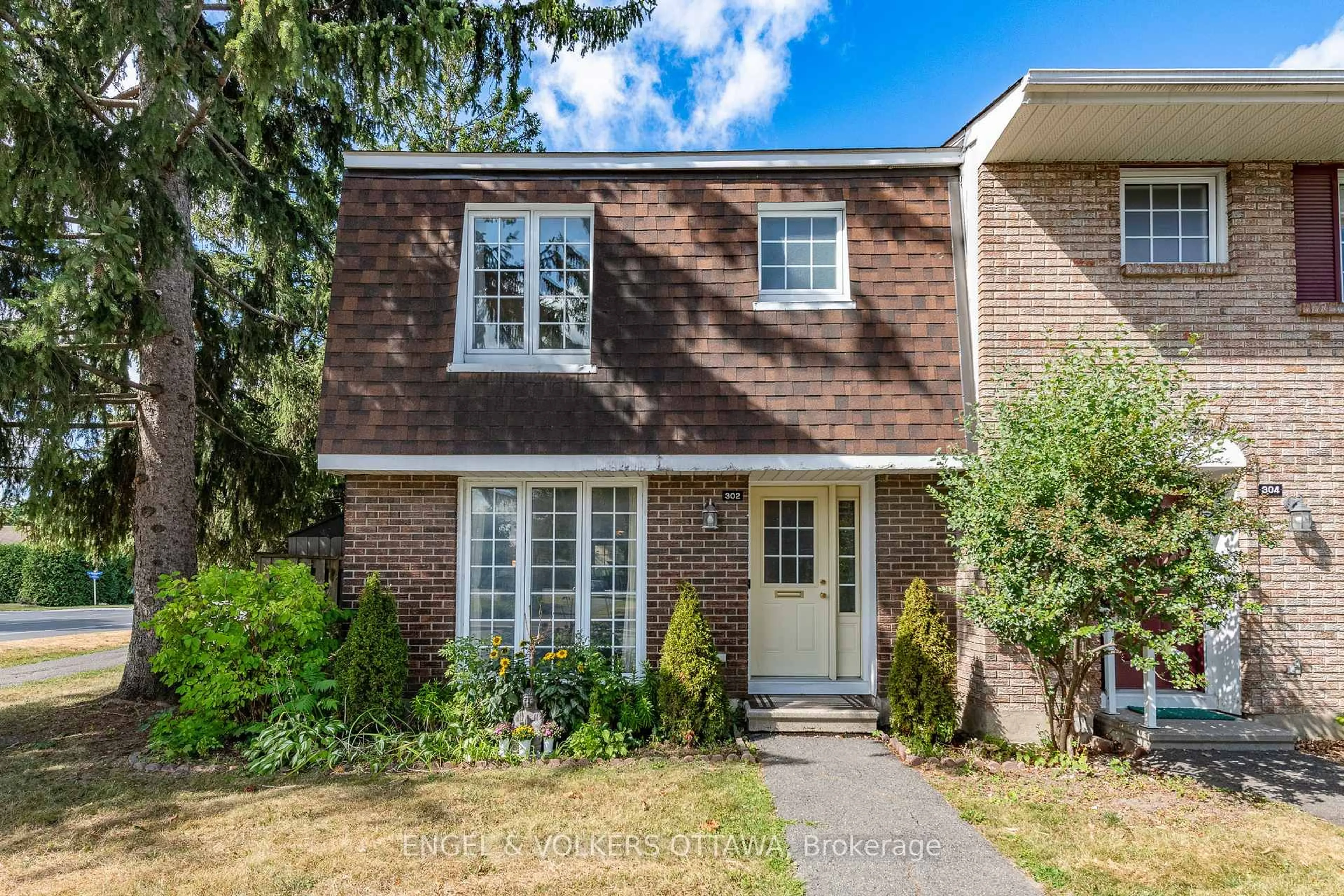 Home with brick exterior material, street for 302 Kintyre Private #105, Ottawa Ontario K2C 3M6