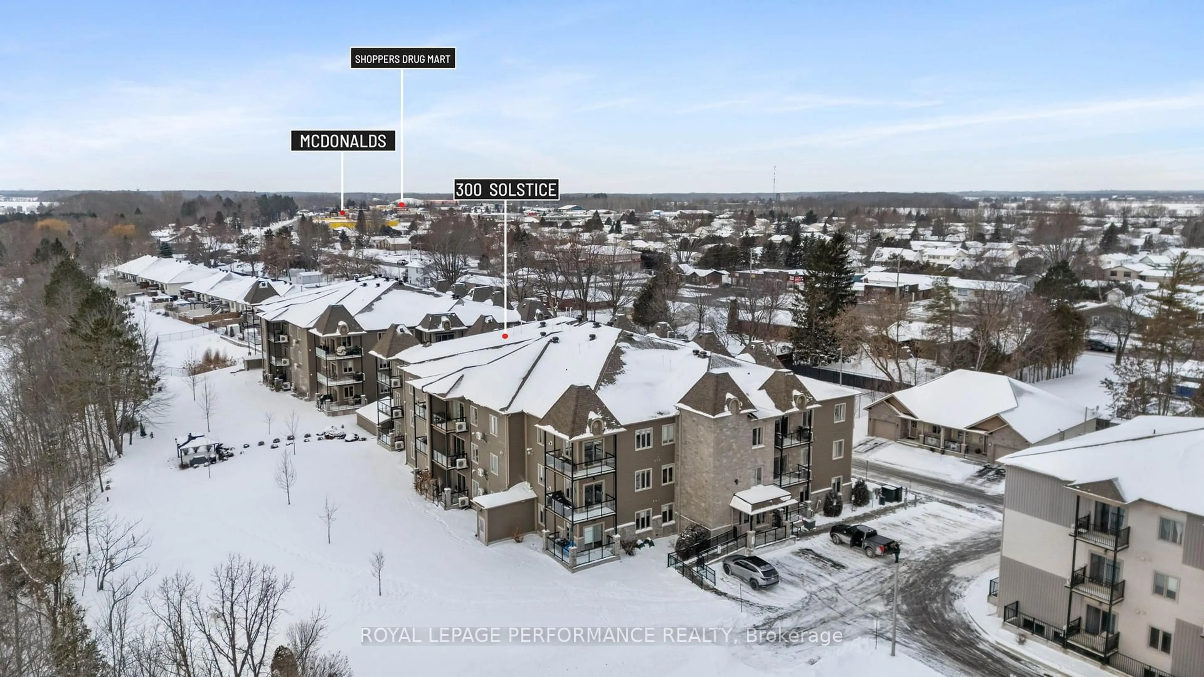 A pic from outside/outdoor area/front of a property/back of a property/a pic from drone, unknown for 300 Solstice Cres #205, Russell Ontario K0A 1W0