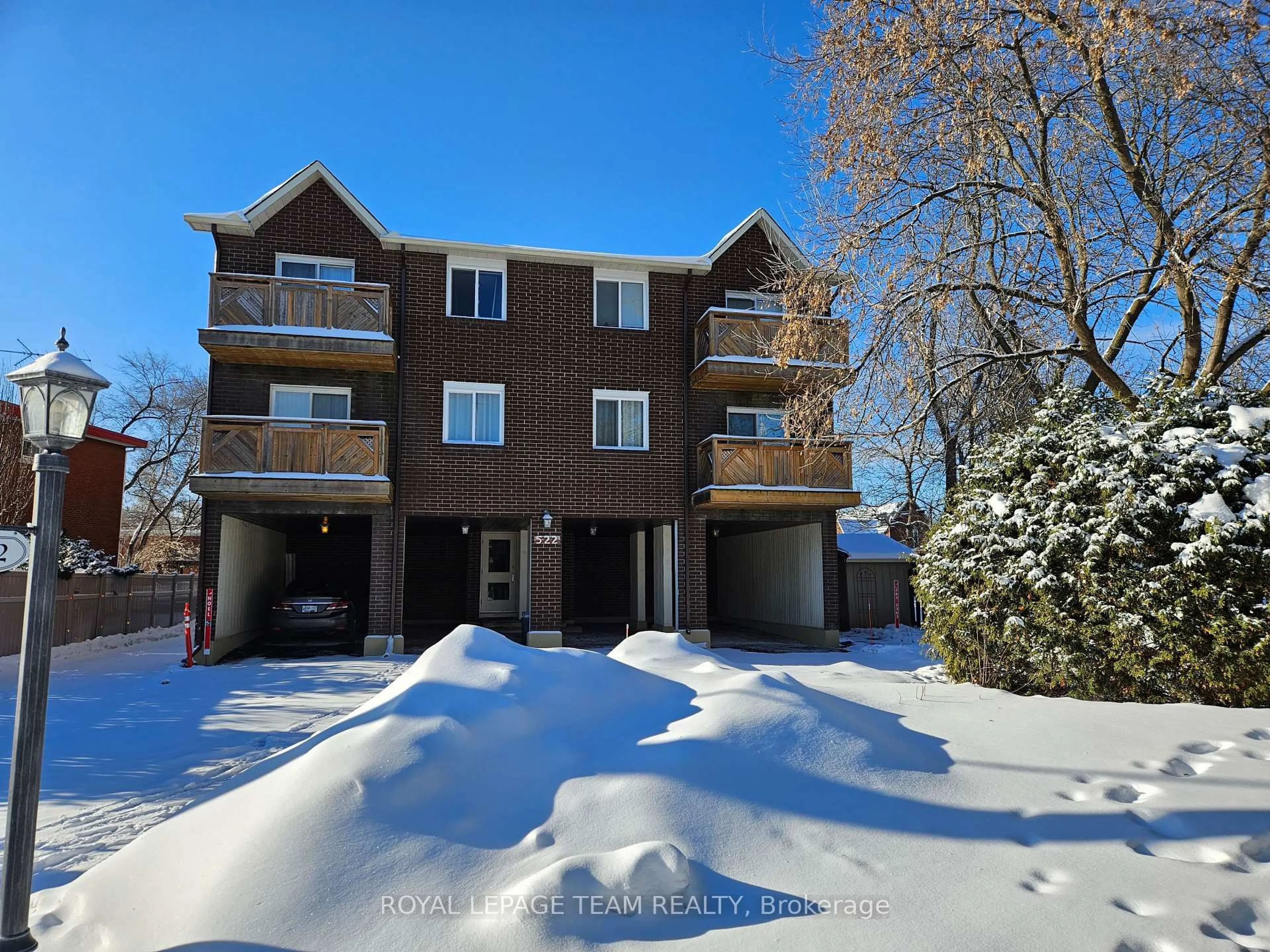 A pic from outside/outdoor area/front of a property/back of a property/a pic from drone, unknown for 522 Riverdale Ave #5, Ottawa Ontario K1S 1S5