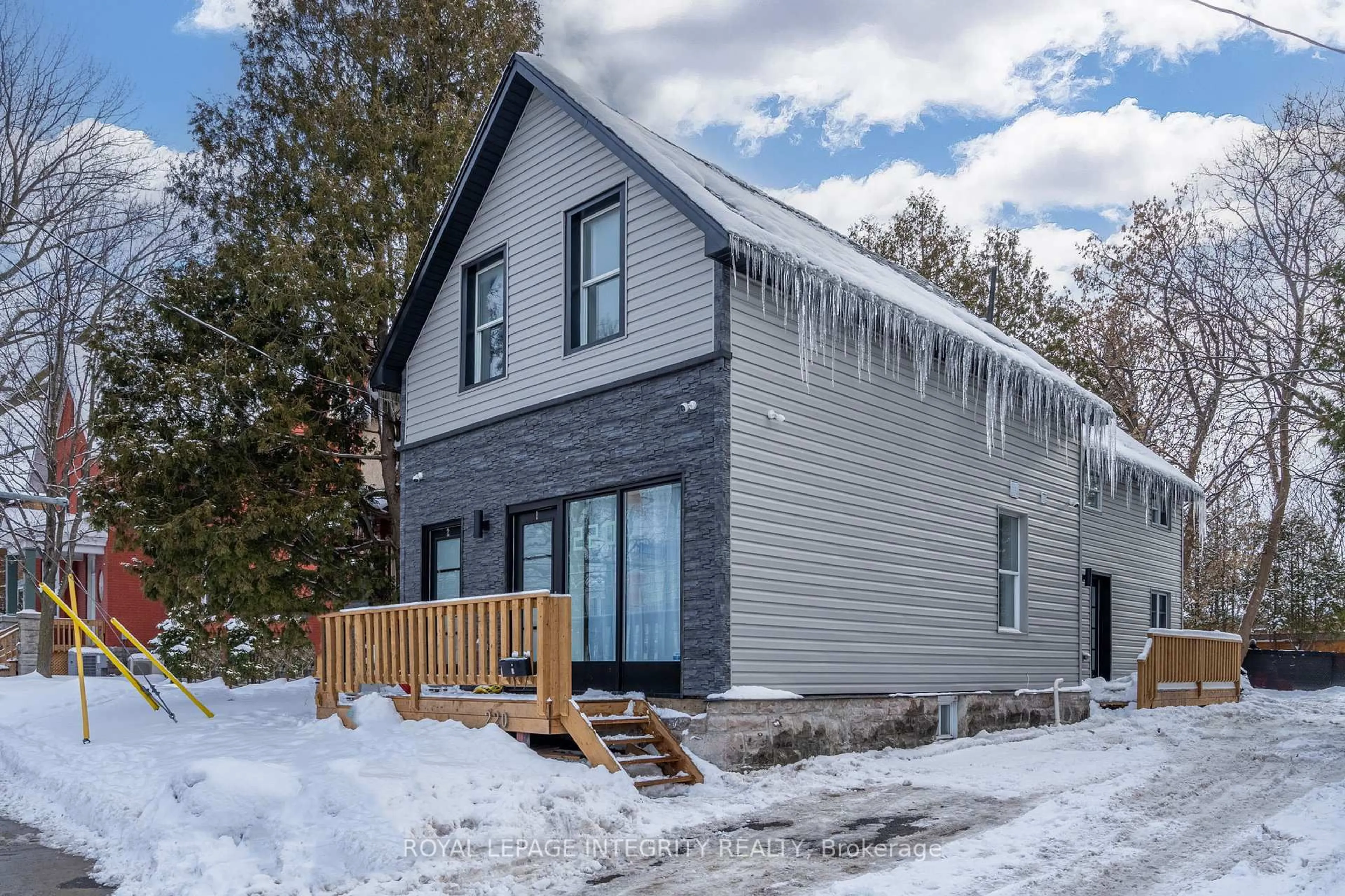 Home with vinyl exterior material, street for 218-220 Mcarthur Ave, Ottawa Ontario K1L 6P5