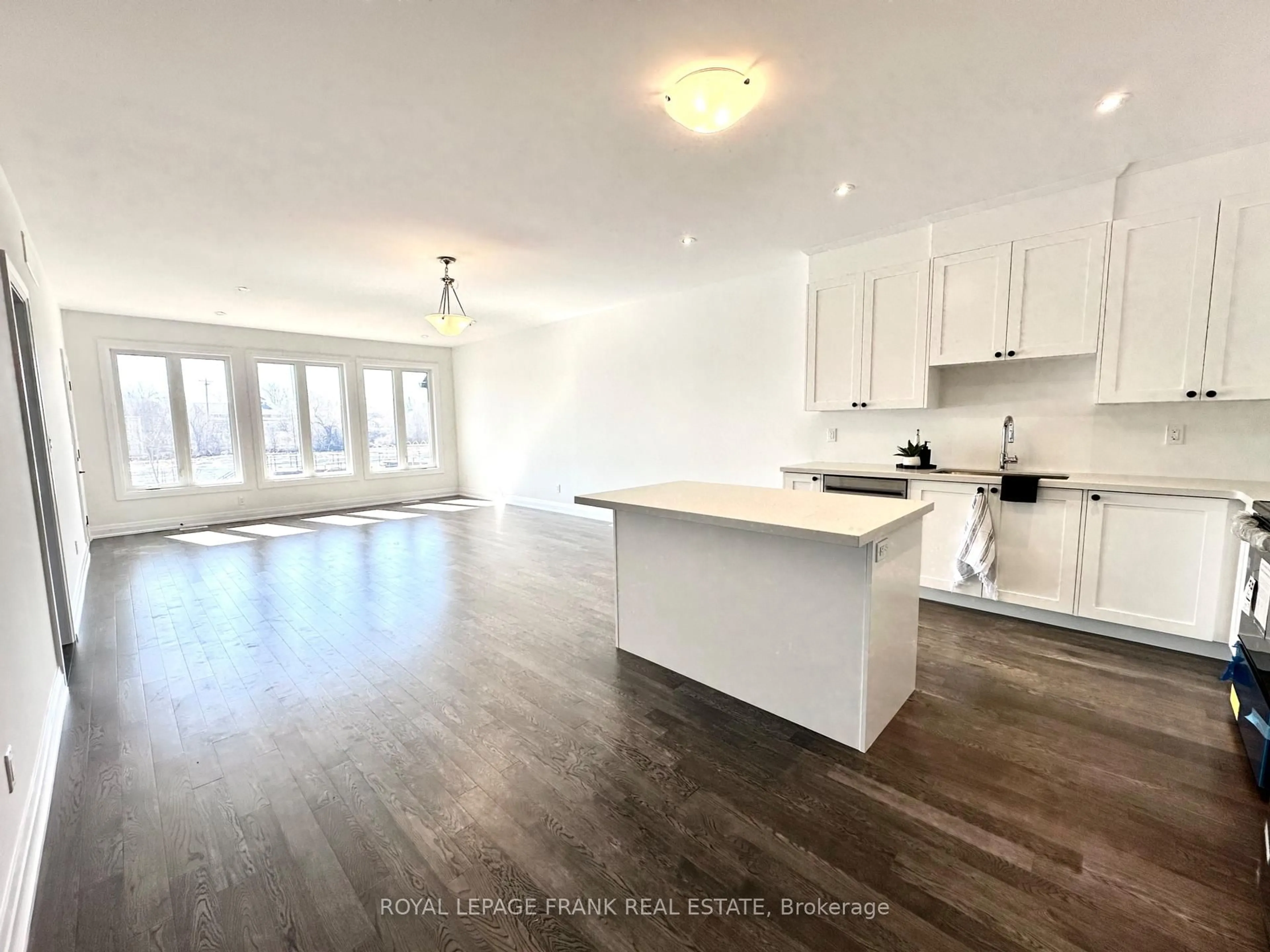 Open concept kitchen, wood/laminate floor for 12 Pond St, Trent Hills Ontario K0L 1Y0